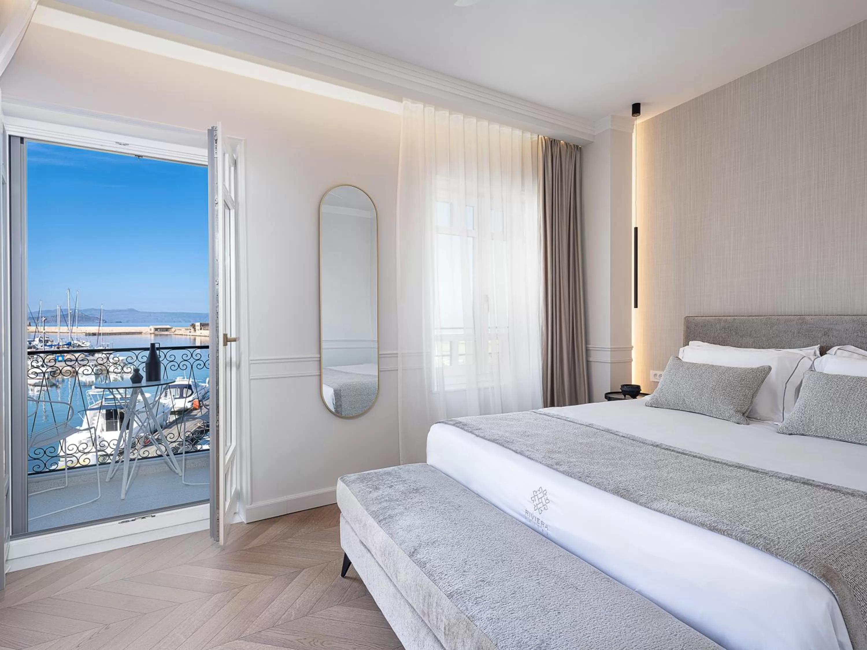 Seating area, Bed in Riviera Suites