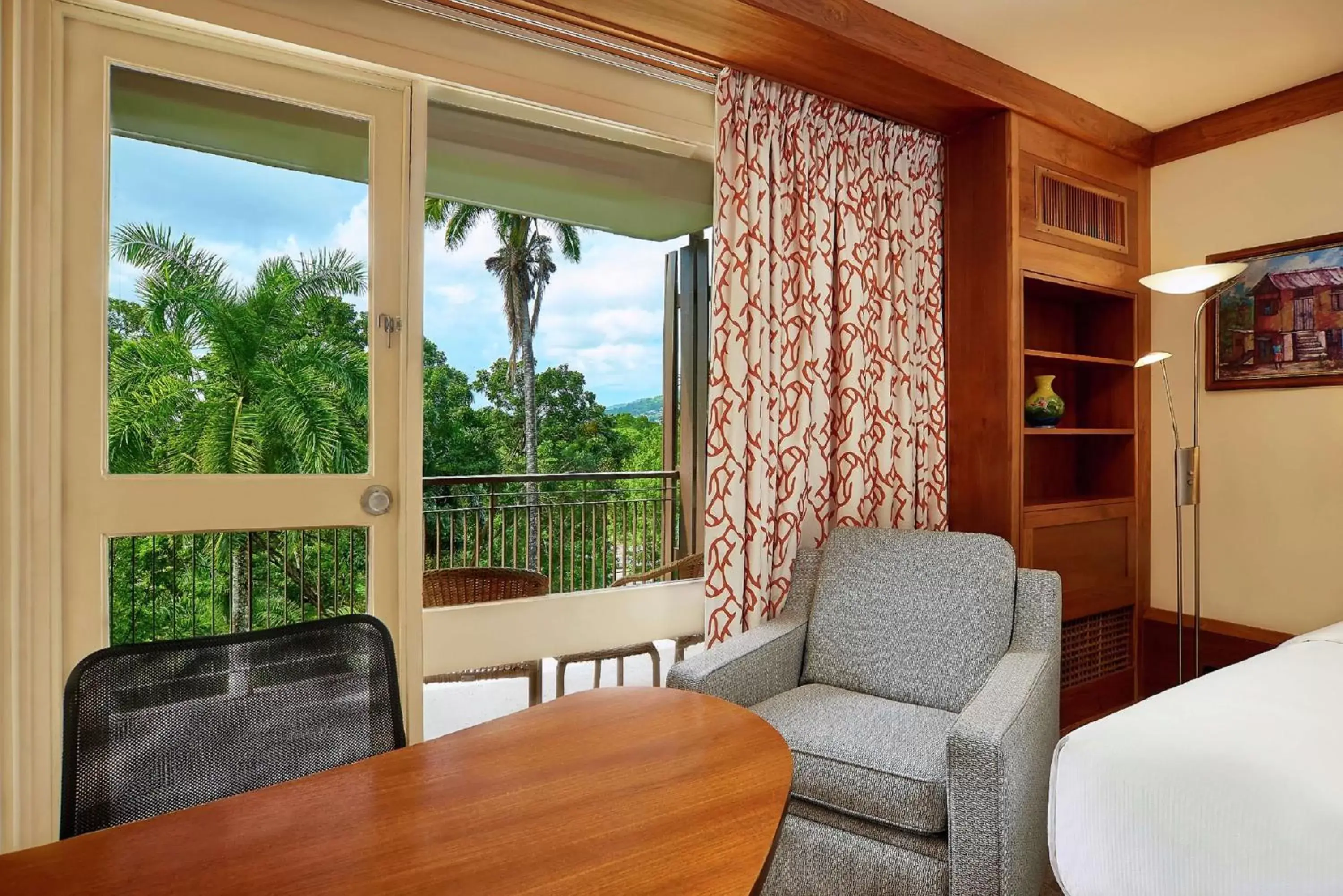 Bedroom, Seating Area in Hilton Trinidad & Conference Centre
