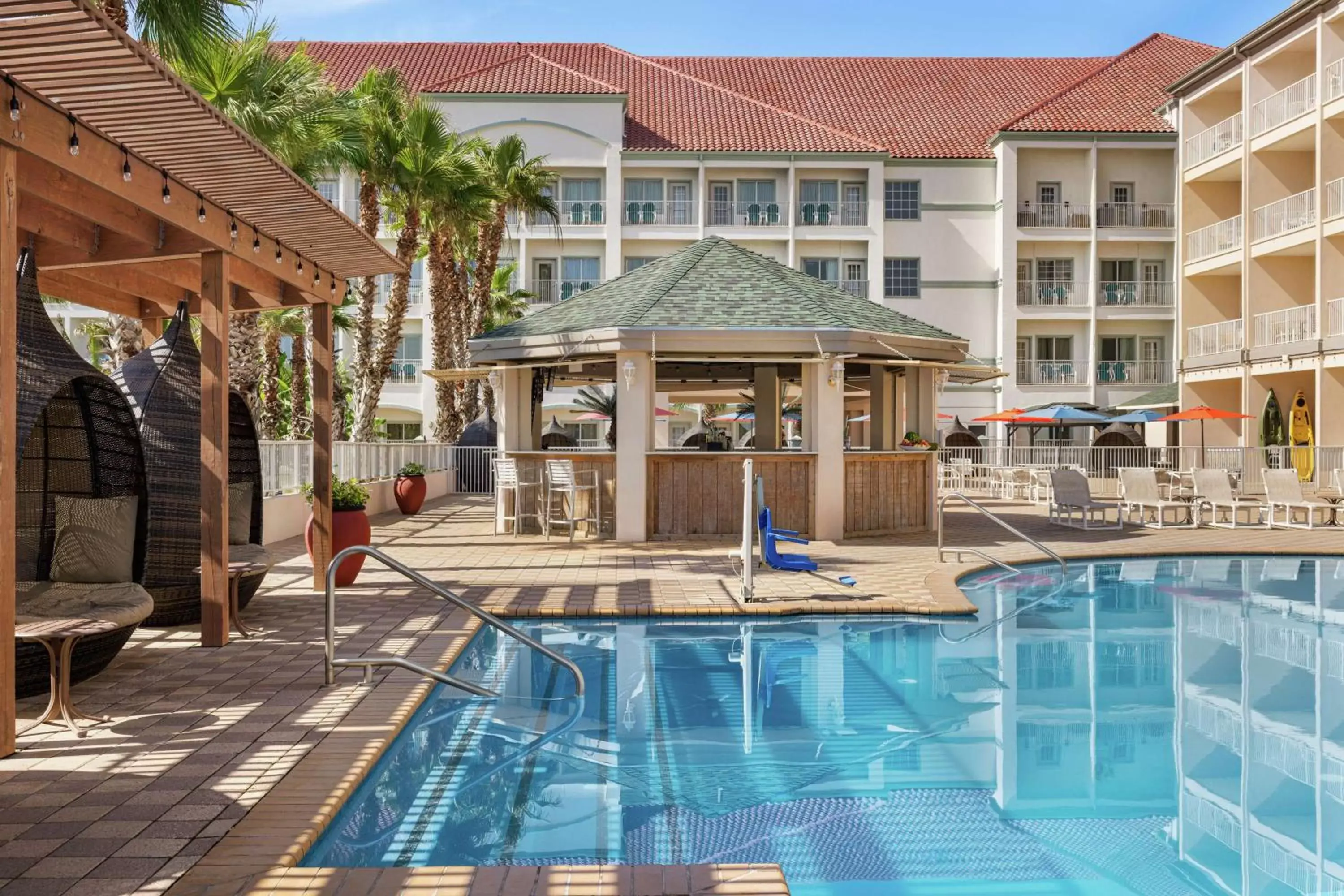 Dining area, Swimming Pool in Hilton Garden Inn South Padre Island