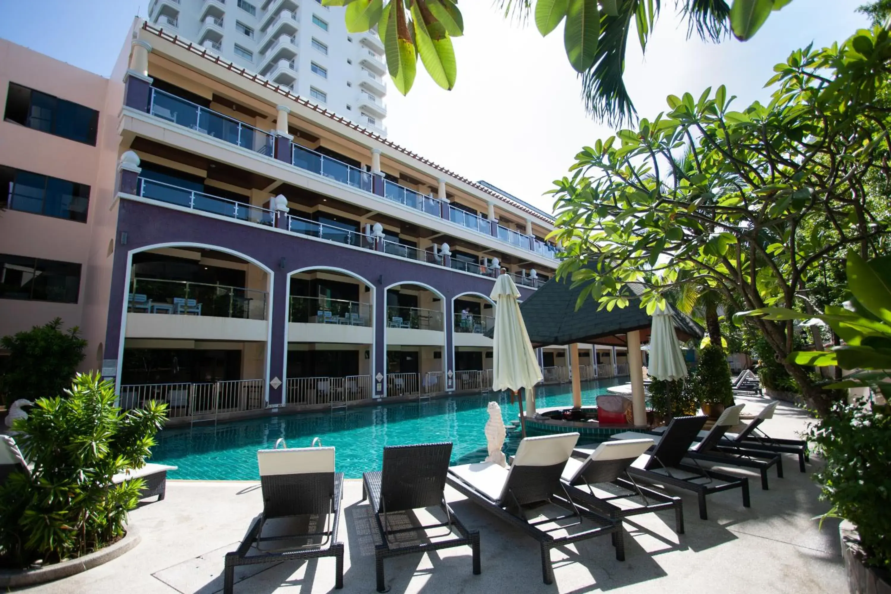 Swimming pool in Karon Sea Sands Resort-SHA PLUS Swimming pool in Karon Sea Sands Resort-SHA PLUS