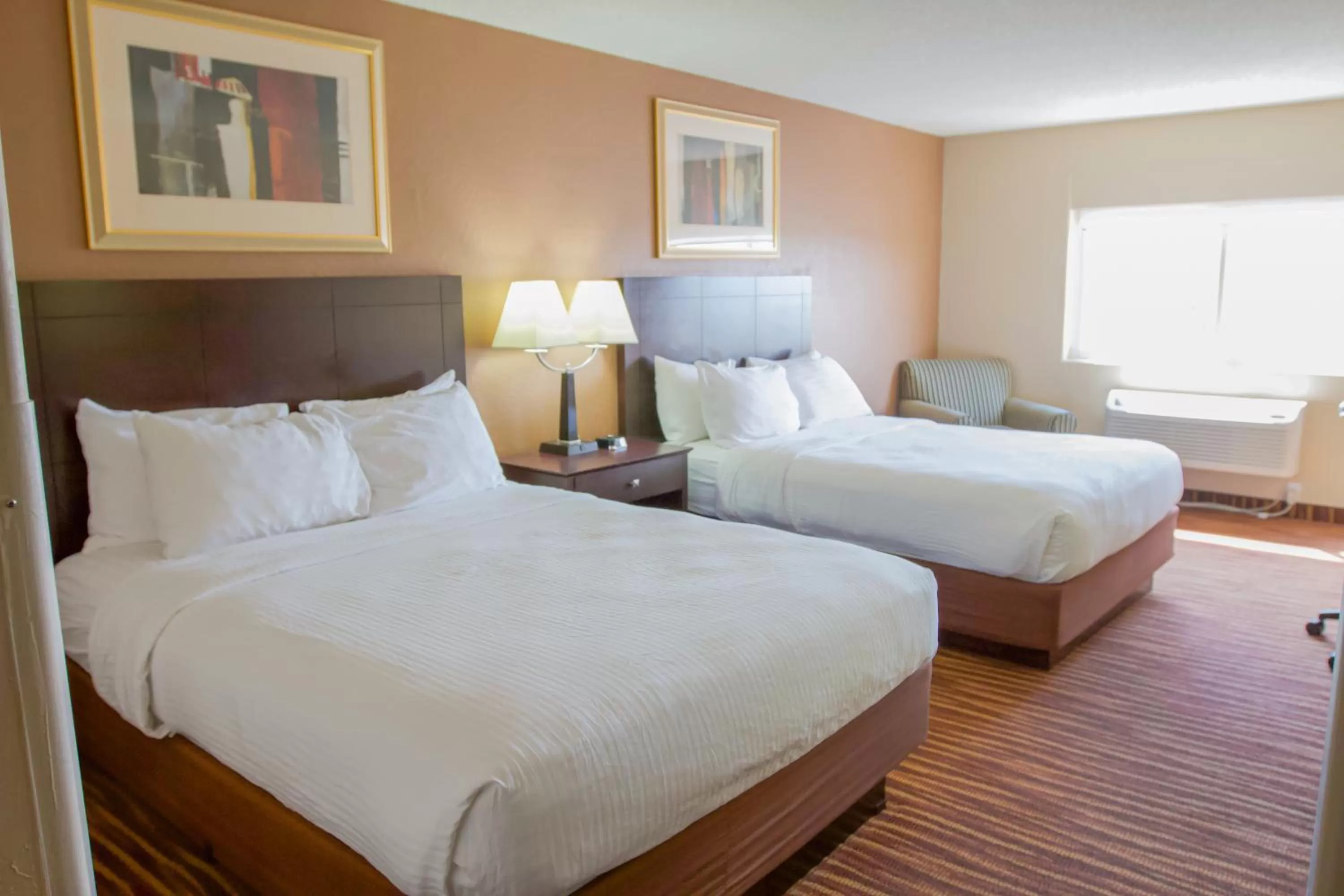 Bed in First Choice Inn at the Swell