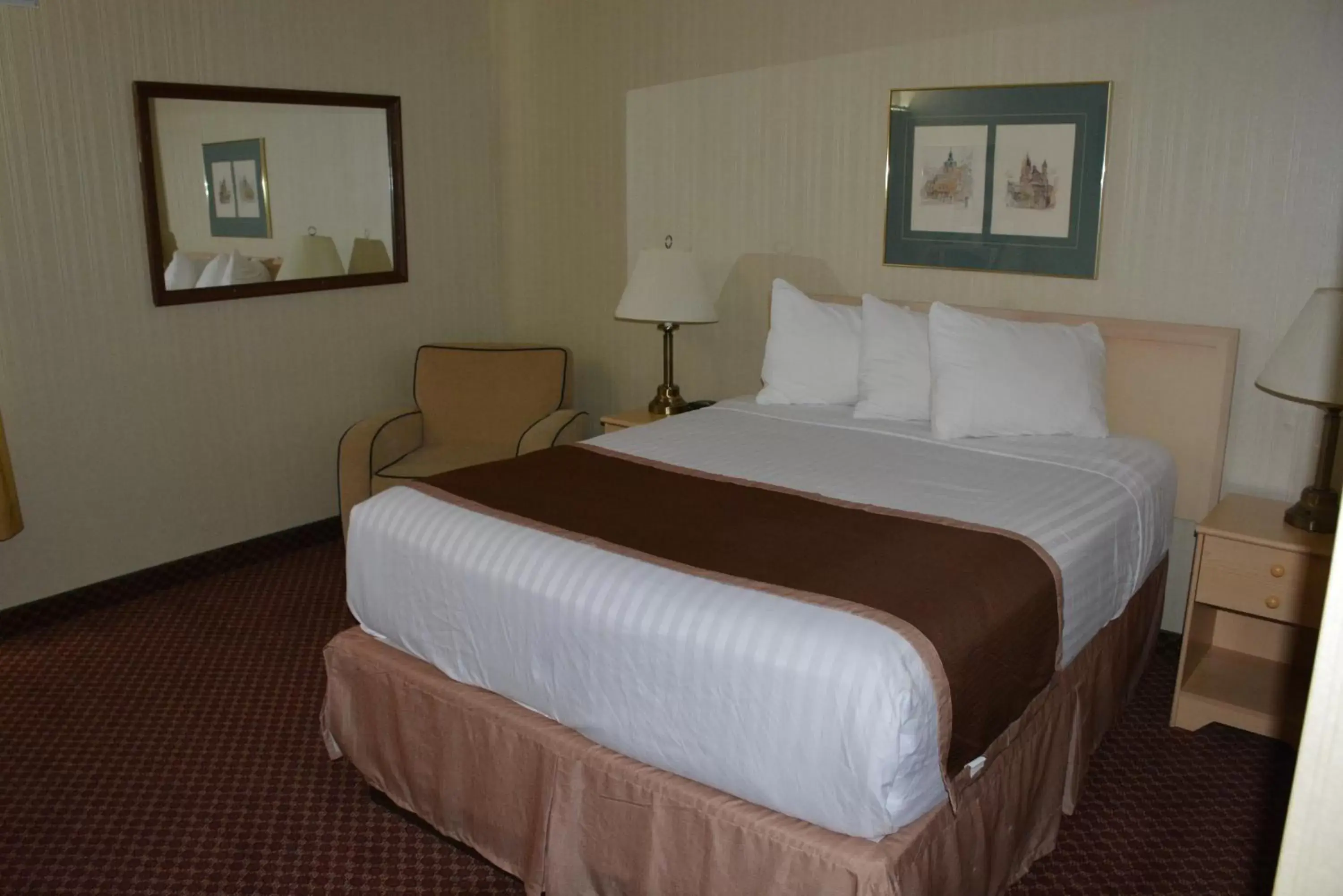 Bedroom, Bed in Travelodge by Wyndham Lethbridge Bedroom, Bed in Travelodge by Wyndham Lethbridge