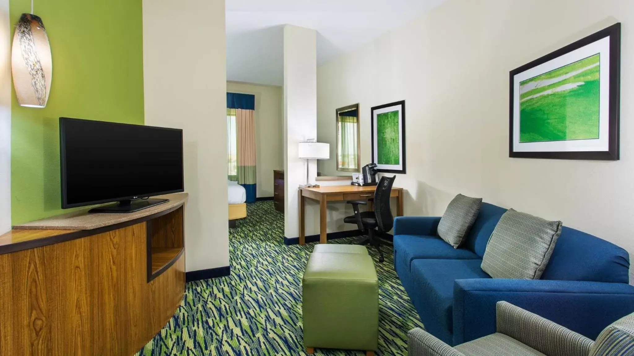 Photo of the whole room, TV/Entertainment Center in Holiday Inn Express & Suites Midland South I-20, an IHG Hotel