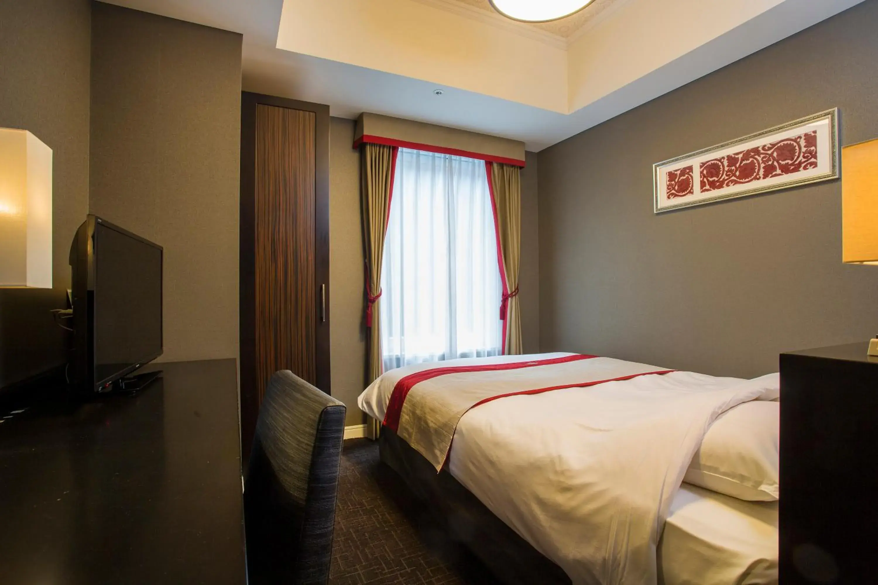 Bed in Hotel Monterey Akasaka