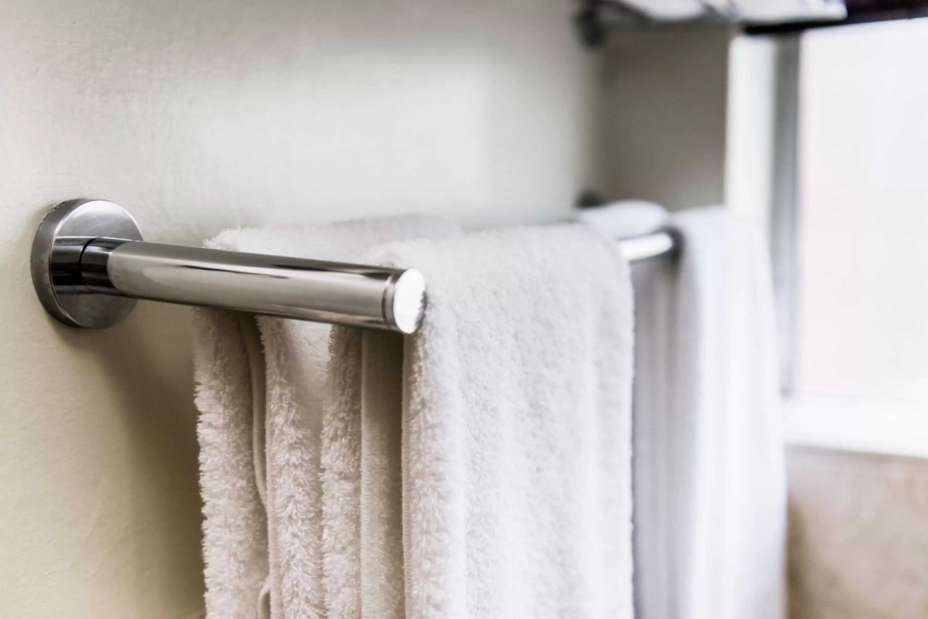 Bathroom in Belaire Suites Hotel