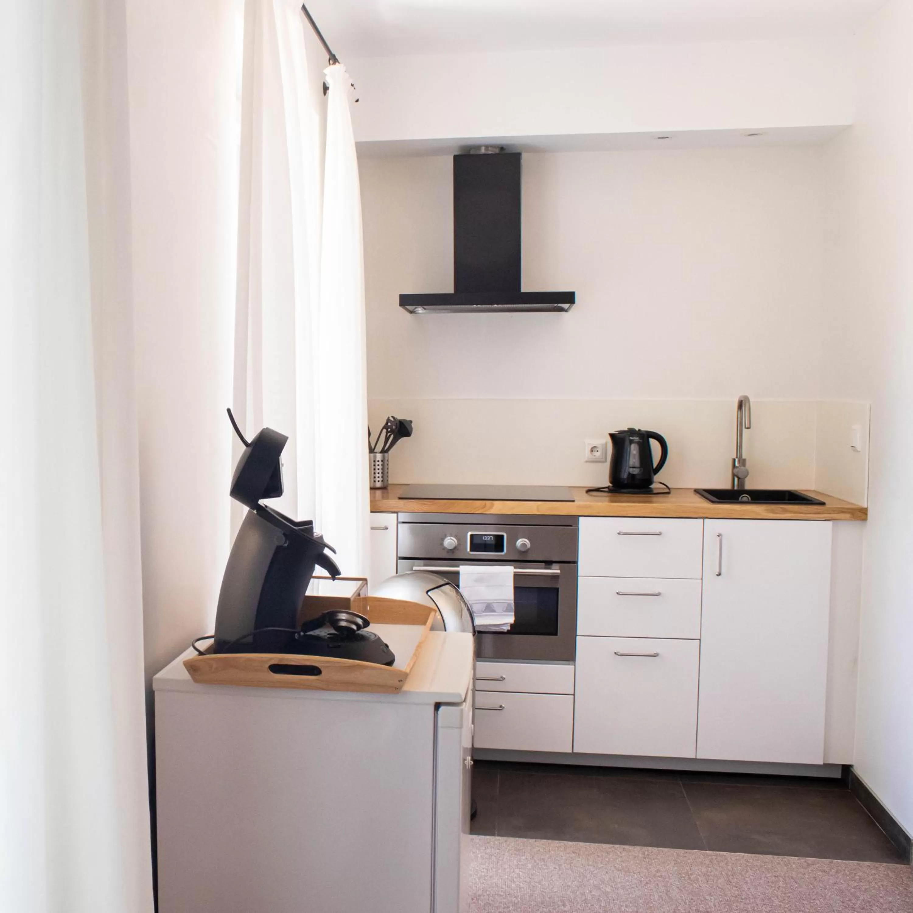 Kitchen or kitchenette in Parkhotel Wolfsburg