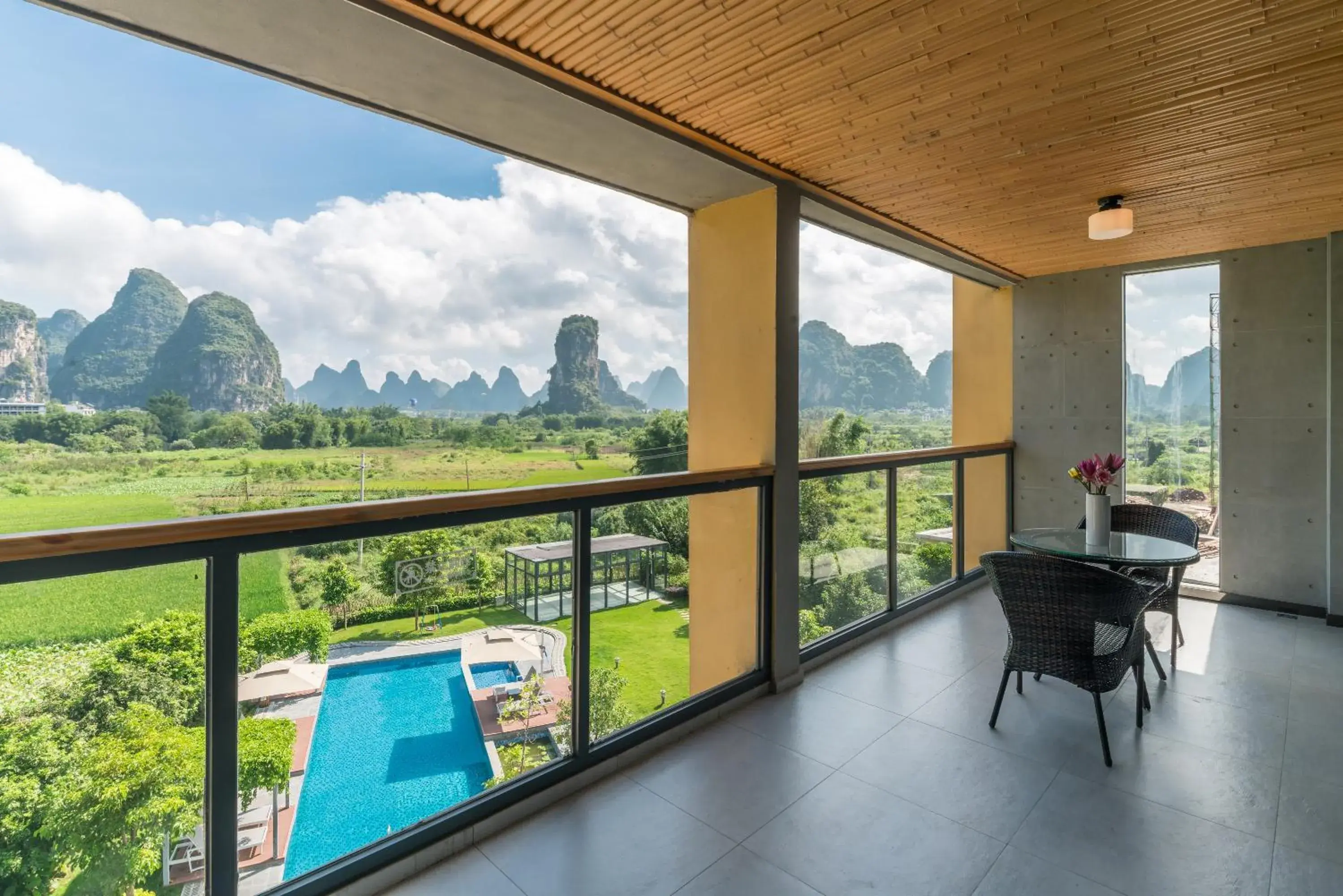 Balcony/Terrace, Pool View in Yangshuo Zen Garden Resort