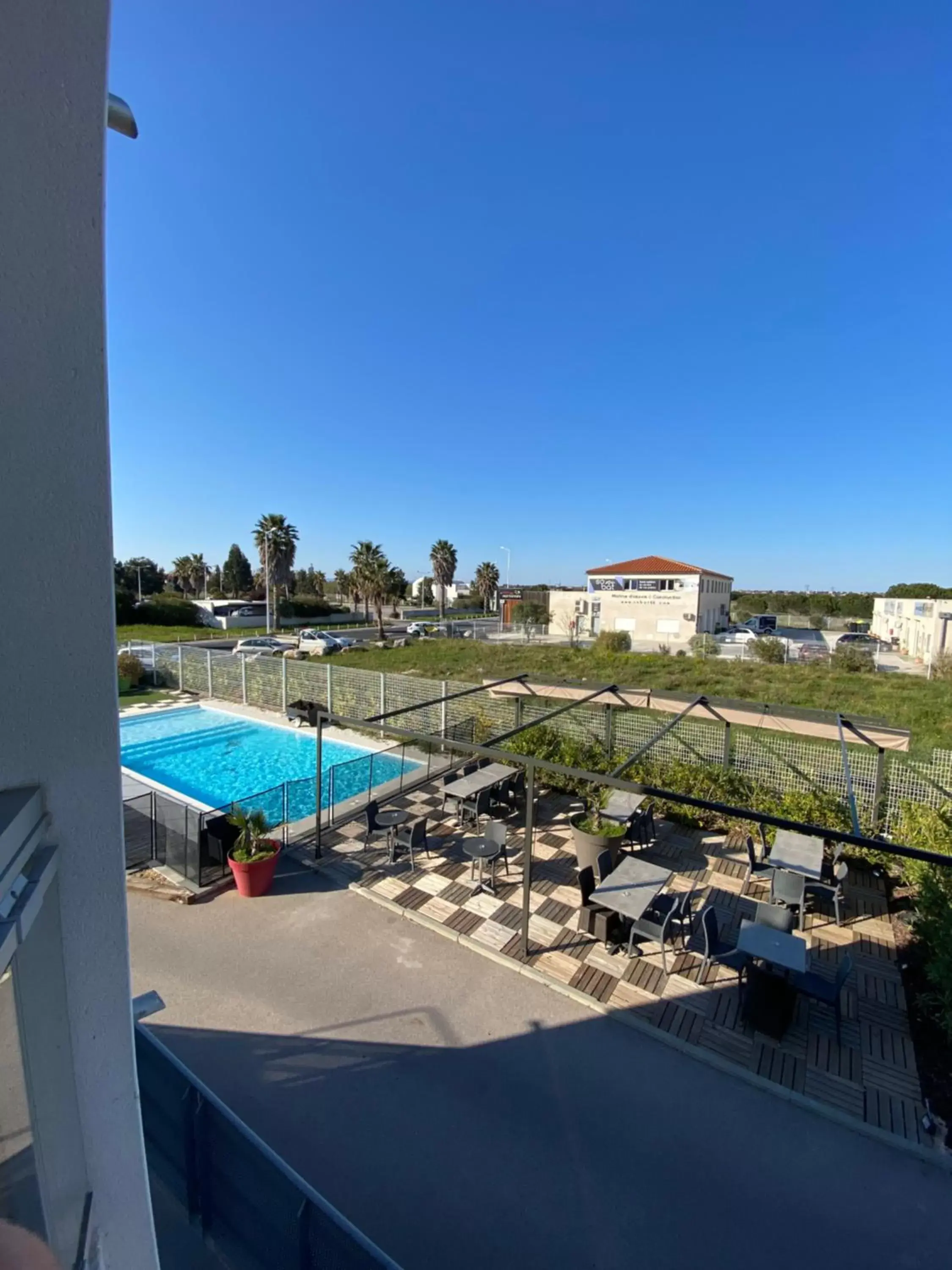 View (from property/room), Pool View in The Originals City, Hôtel Les Dômes, Perpignan Sud Saleilles