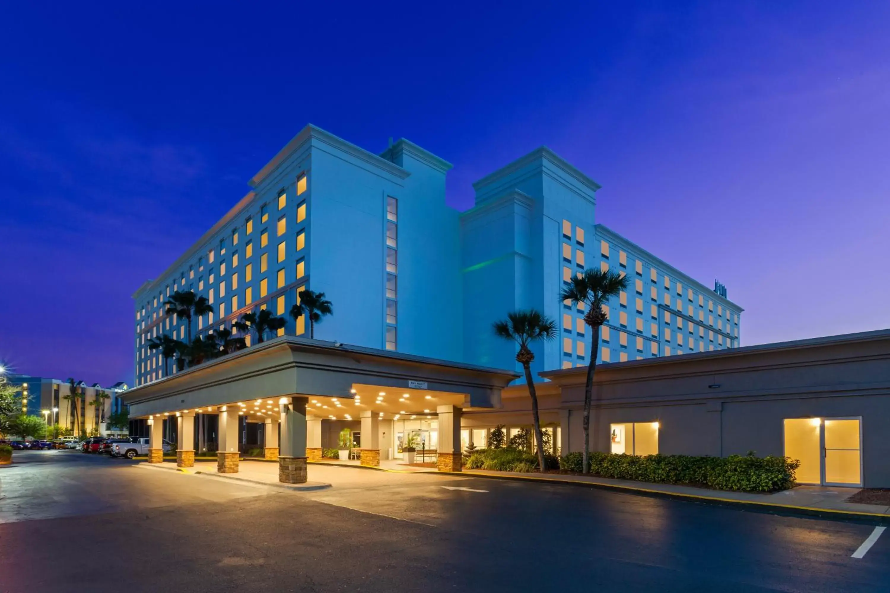 Lobby or reception, Property Building in Holiday Inn & Suites Across From Universal Orlando, an IHG Hotel
