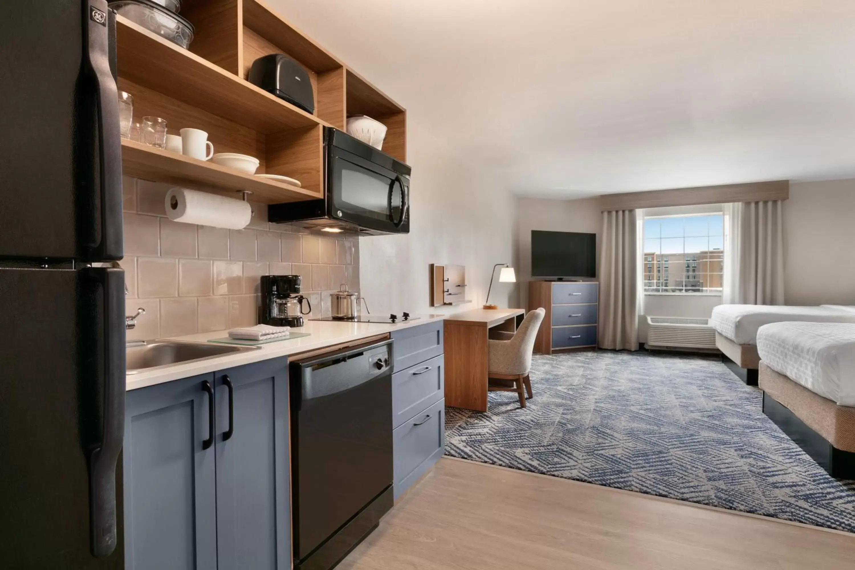 Kitchen or kitchenette, Kitchen/Kitchenette in Candlewood Suites - Asheville Downtown, an IHG Hotel