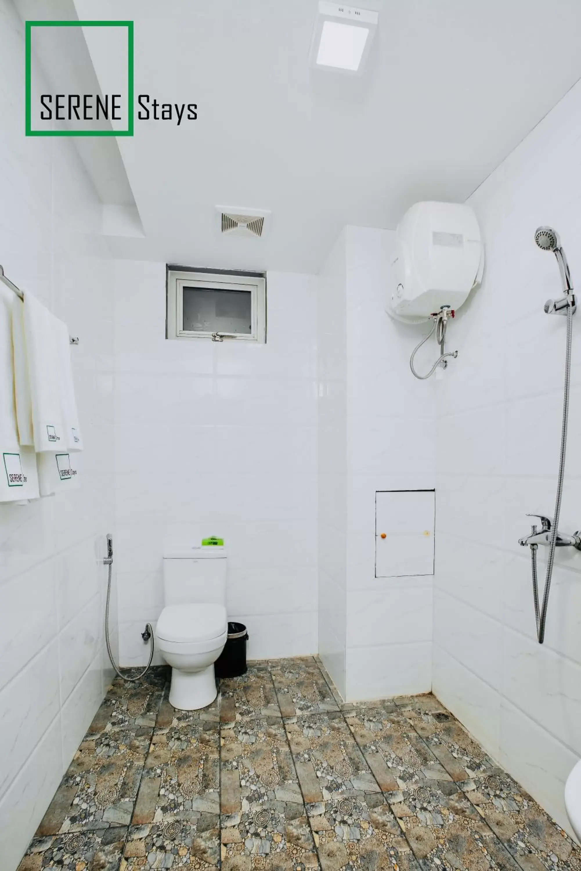 Bathroom in SERENE Stays Hotel