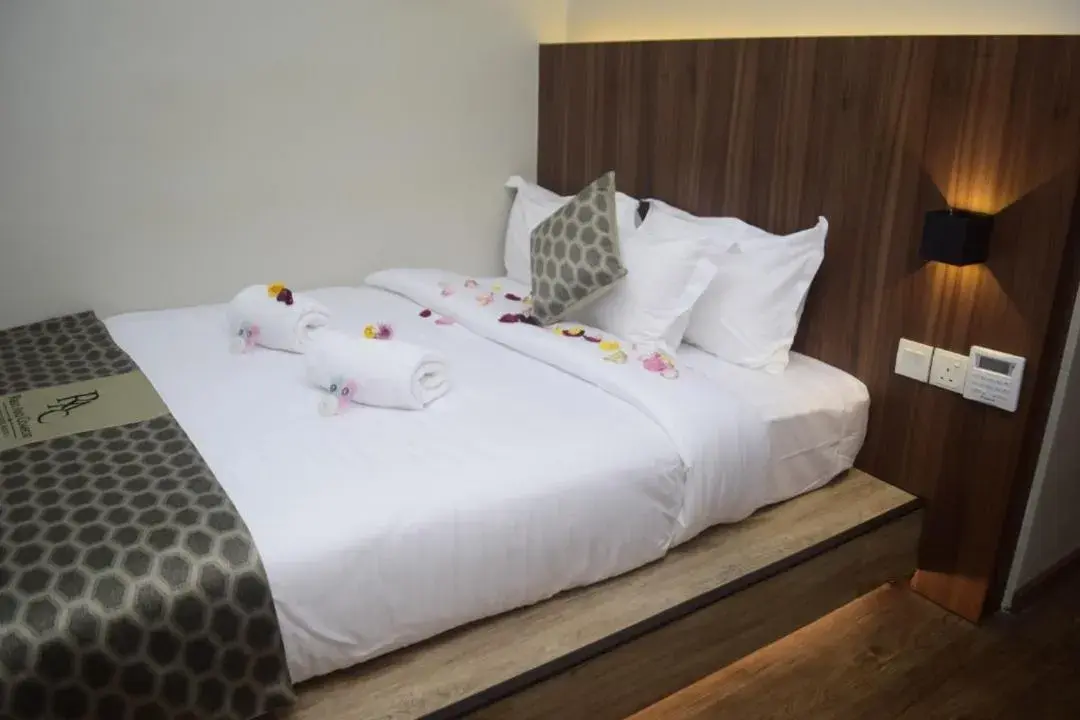Bed in Rest And Comfort Boutique Hotel