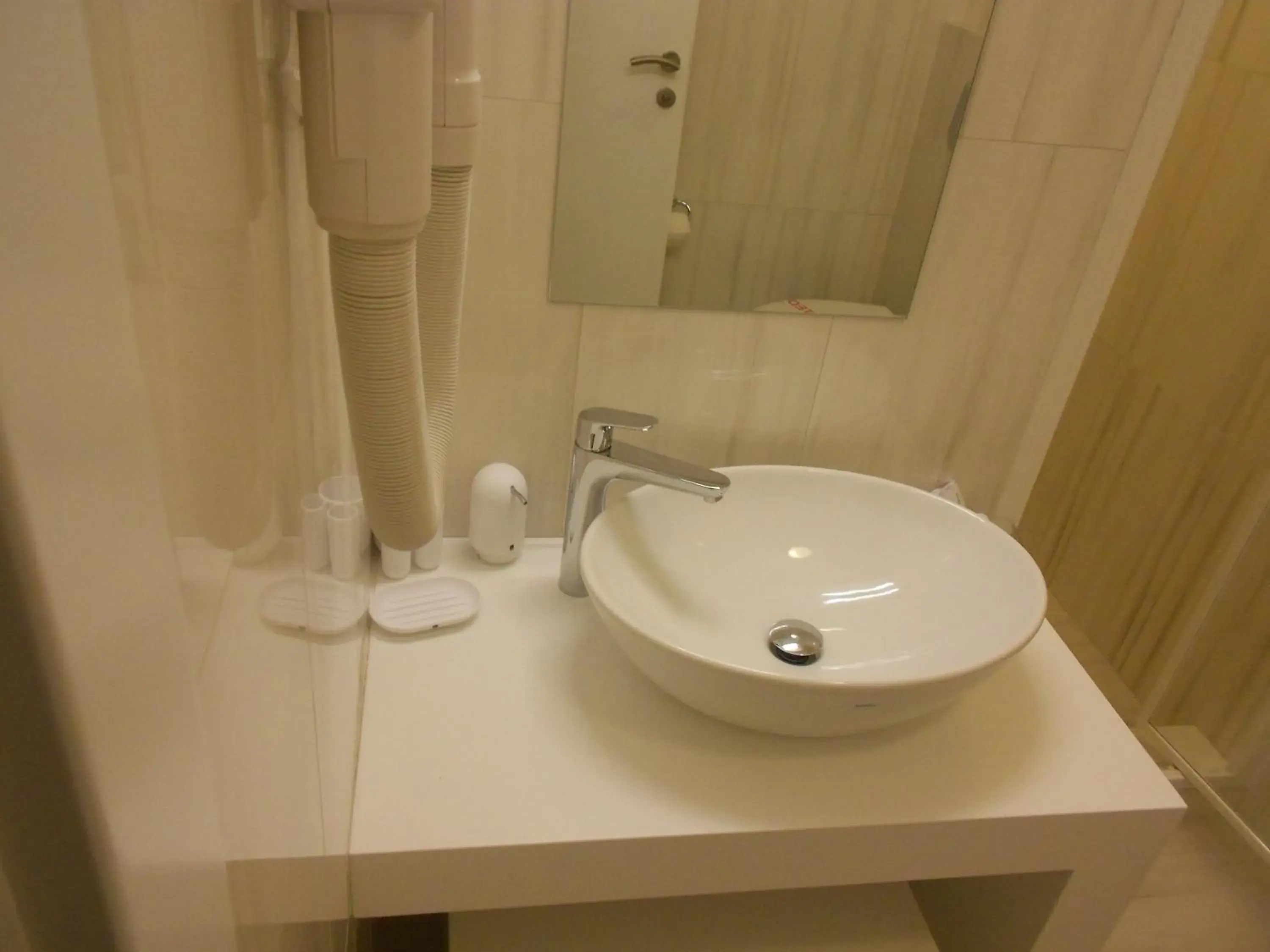 Bathroom in Leonardo Hotel