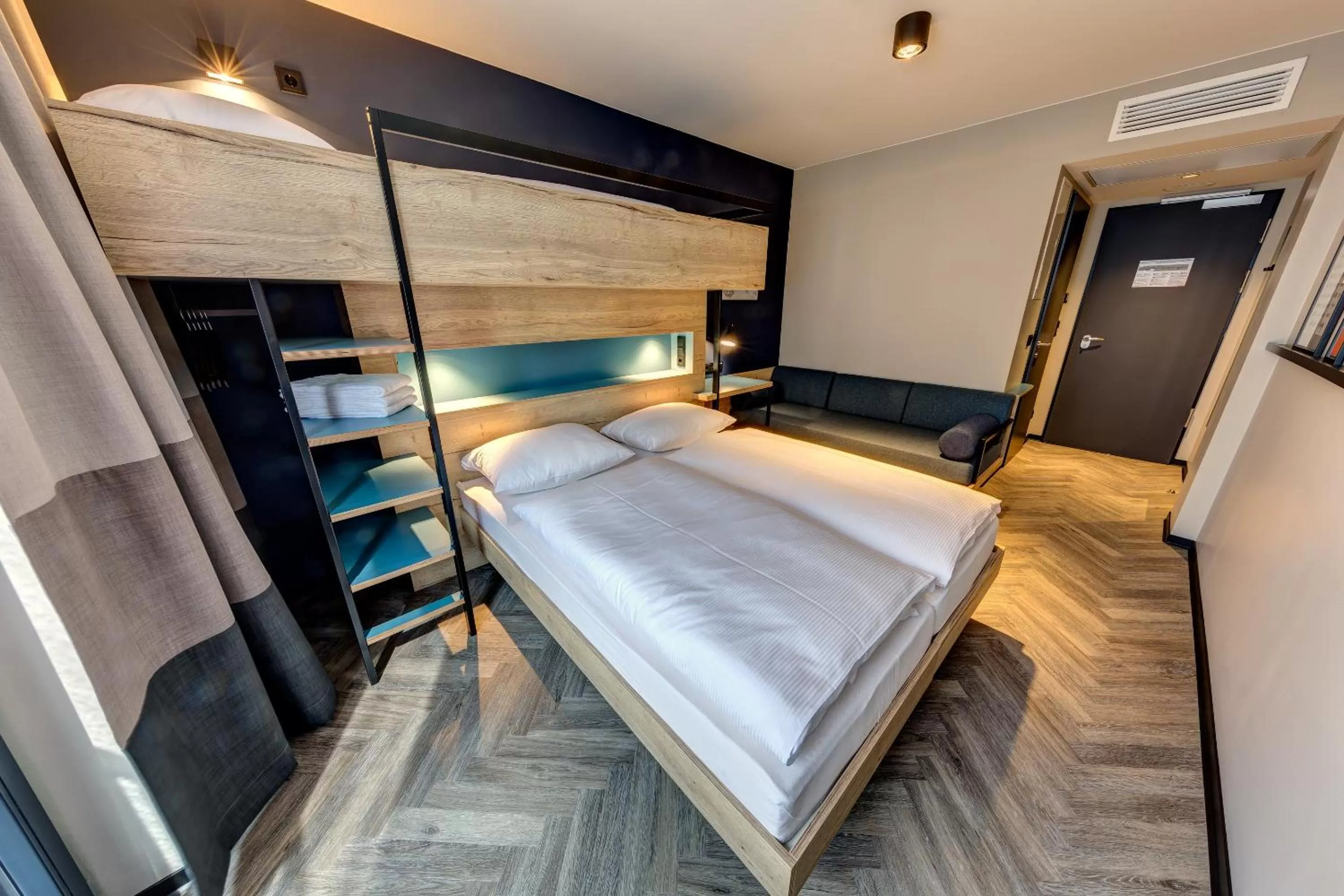 Bed in Schulz Hotel Berlin Wall at the East Side Gallery