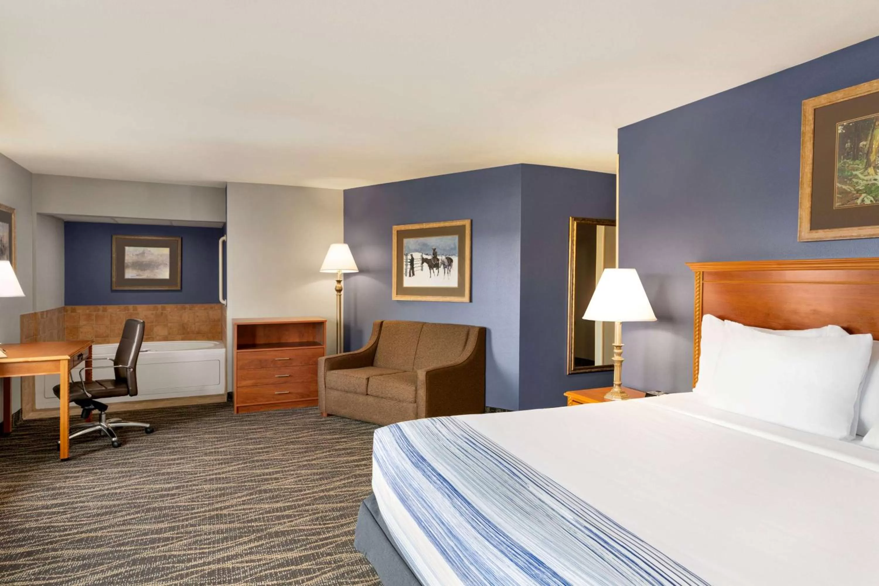 Photo of the whole room, Bed in AmericInn by Wyndham Laramie Near University of Wyoming