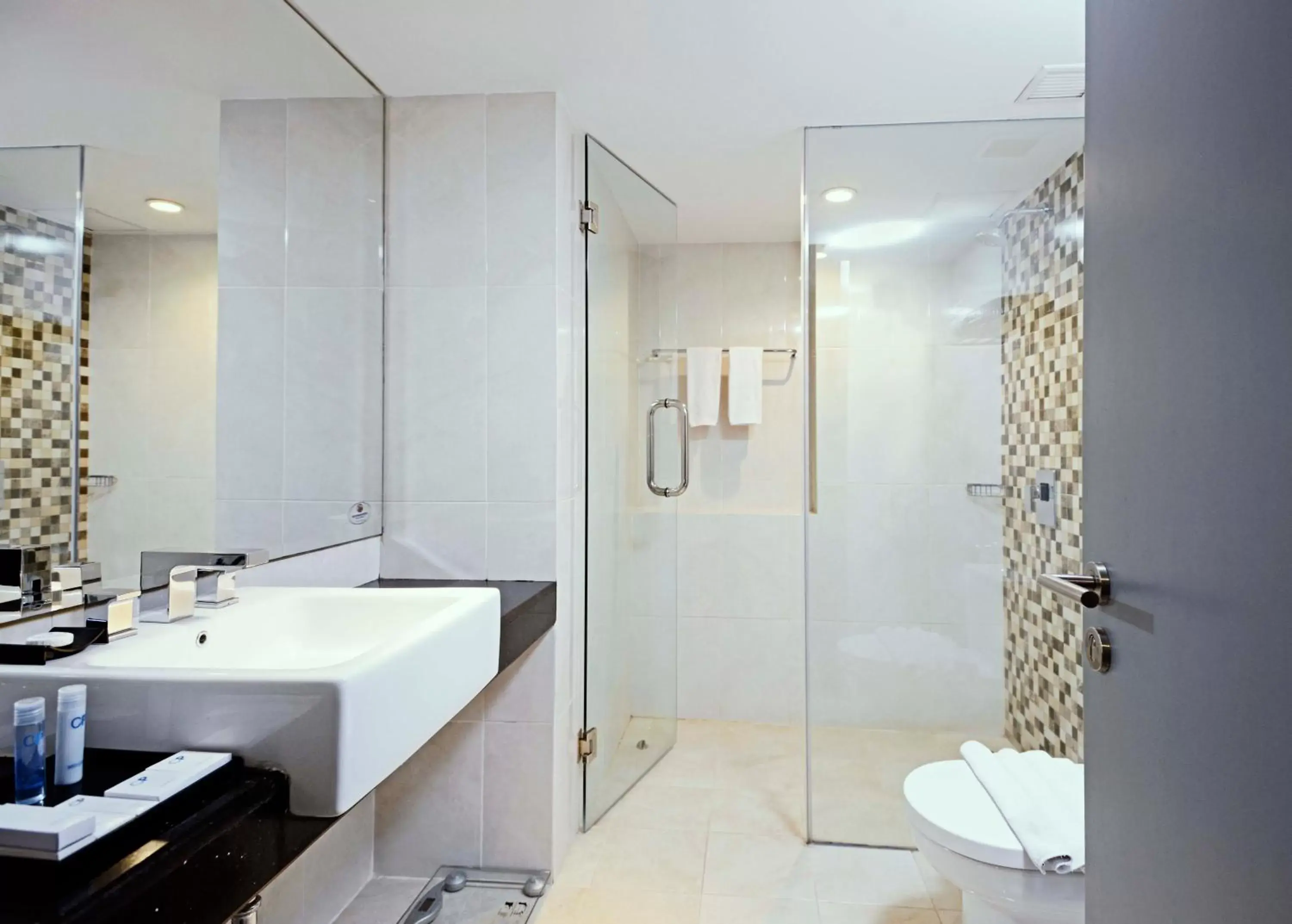 Bathroom in CROWN PRINCE Hotel Surabaya Managed by Midtown Indonesia