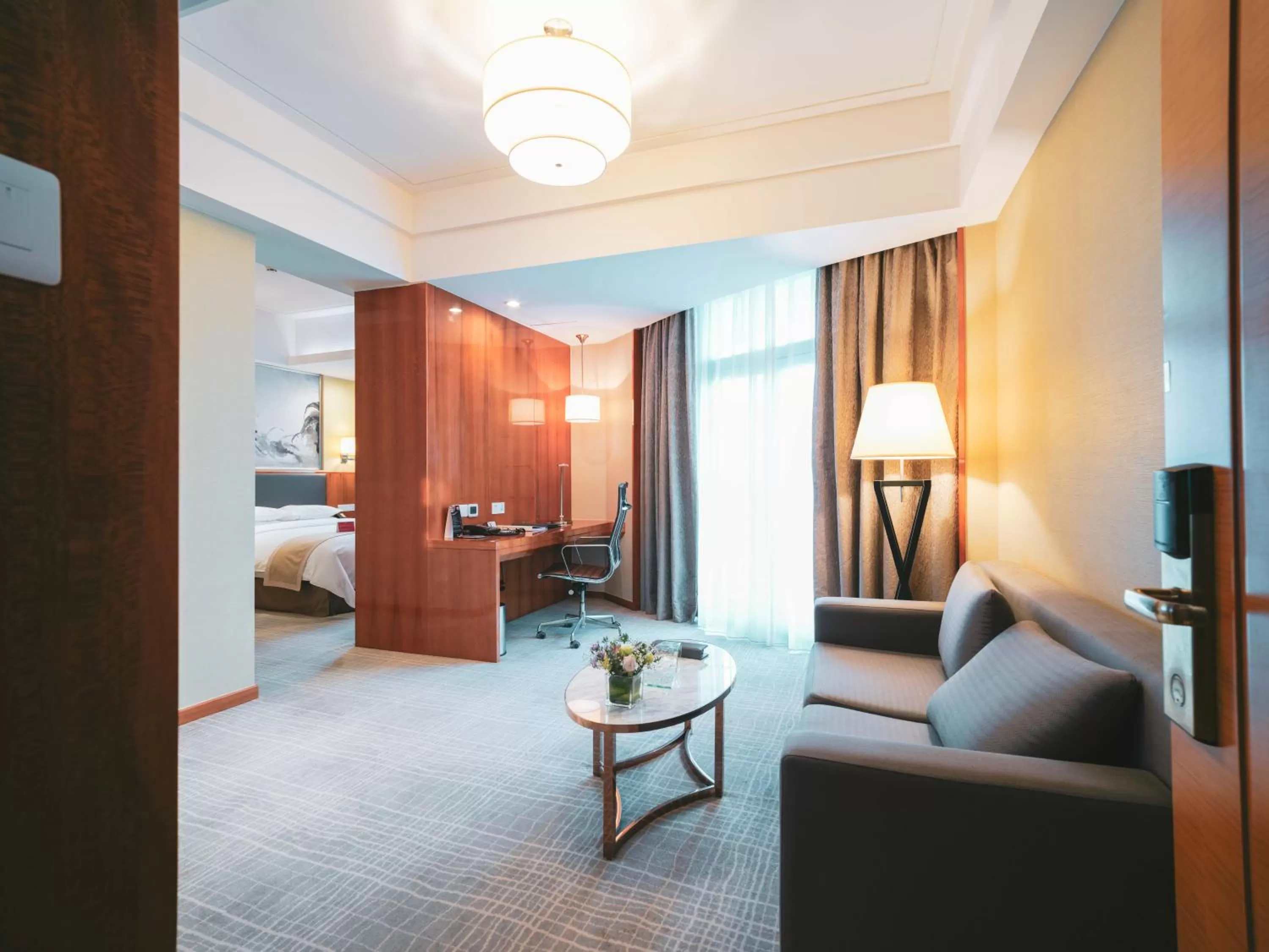 Living room, Bed in Ramada Plaza Shanghai Pudong Airport - 3 mins to PVG depature floor & check entrance with hotel shuttle