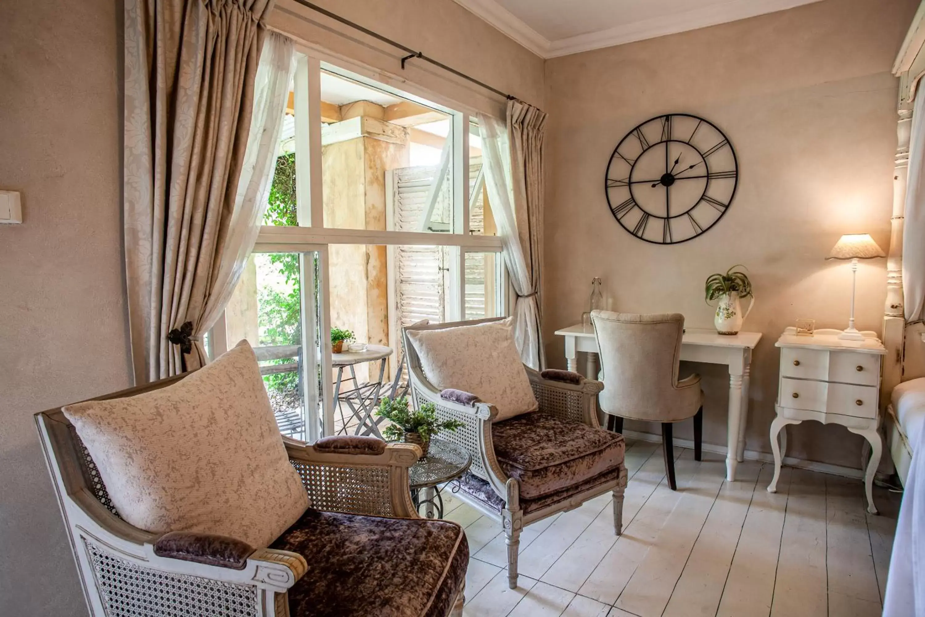 Bedroom, Seating Area in Petite Provence B&B