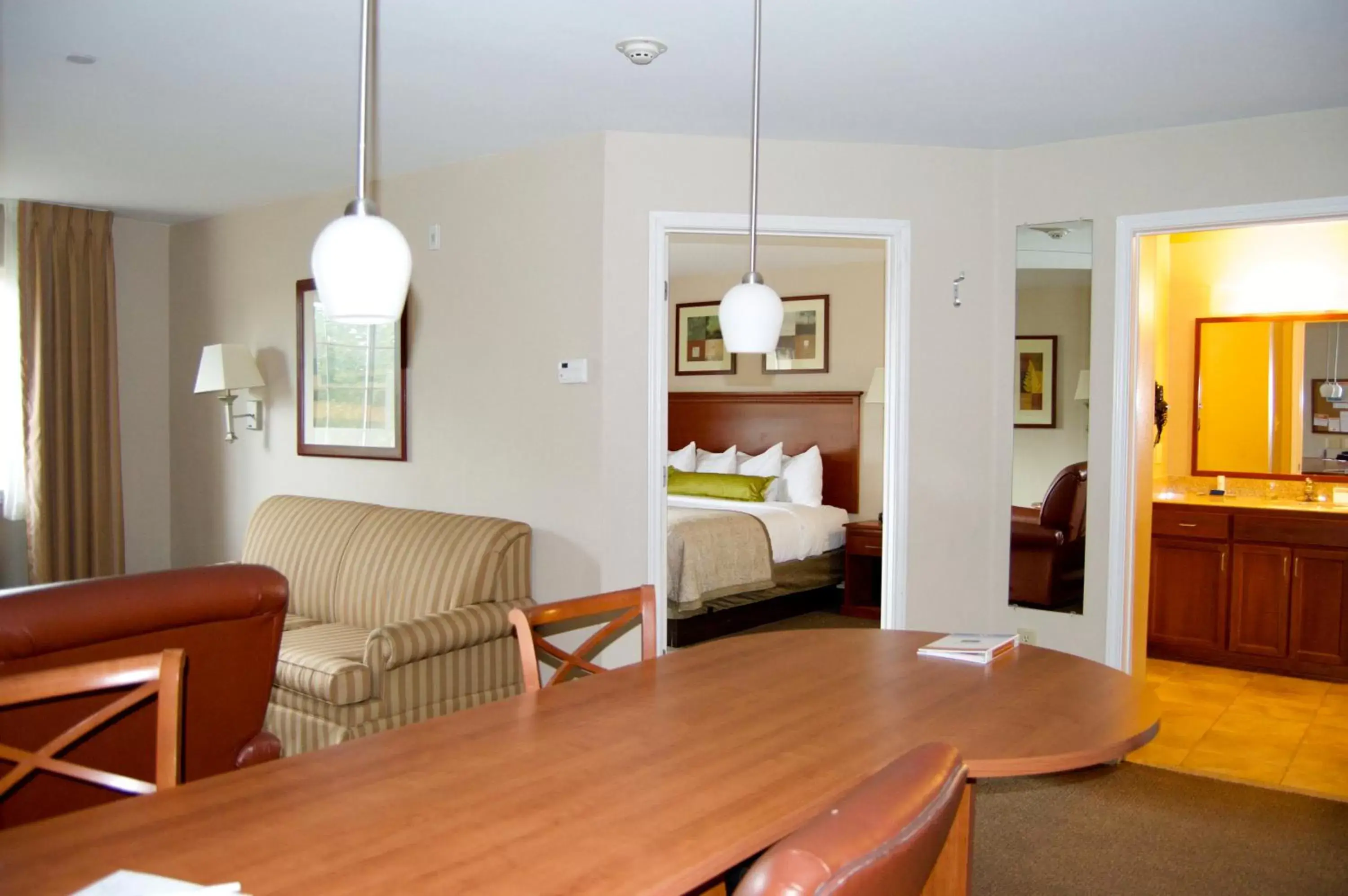 Bedroom, Seating Area in Candlewood Victoria, an IHG Hotel