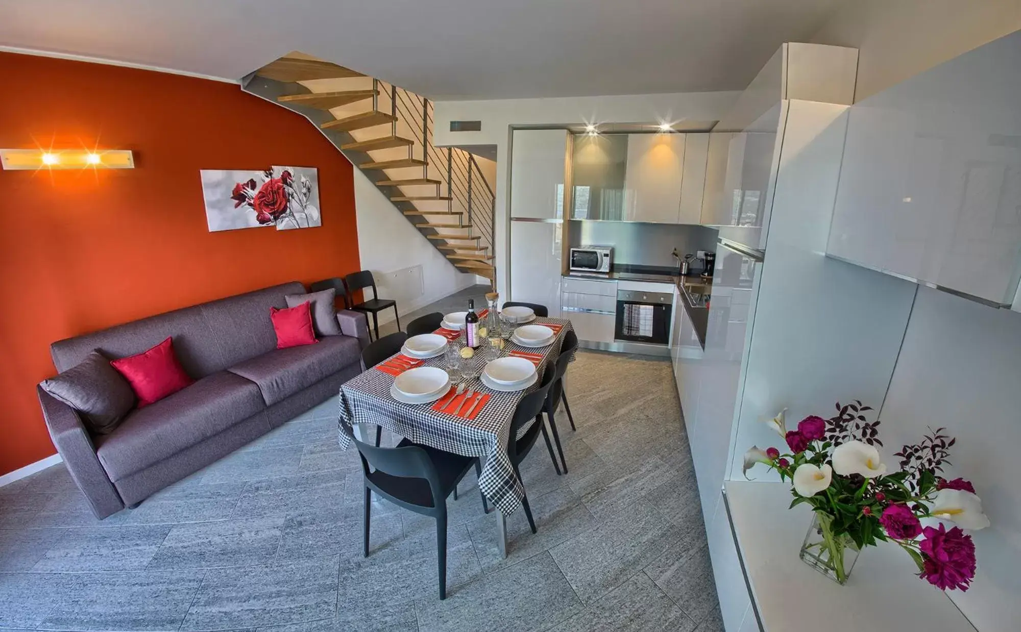 Living room, Kitchen/Kitchenette in Rainbow Holiday Apartments Lake Como