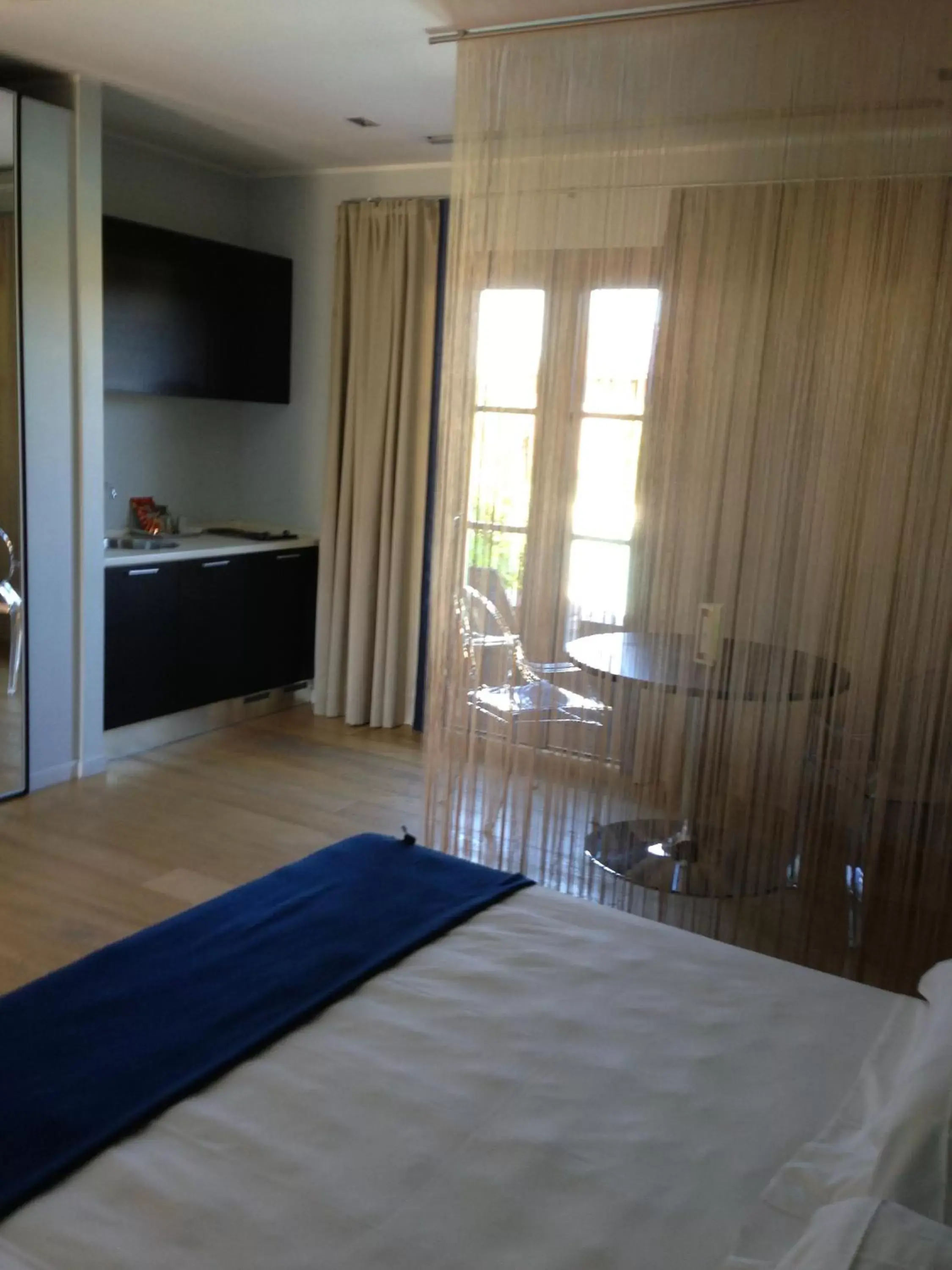 Photo of the whole room, Bed in Joia Hotel & Luxury Apartments