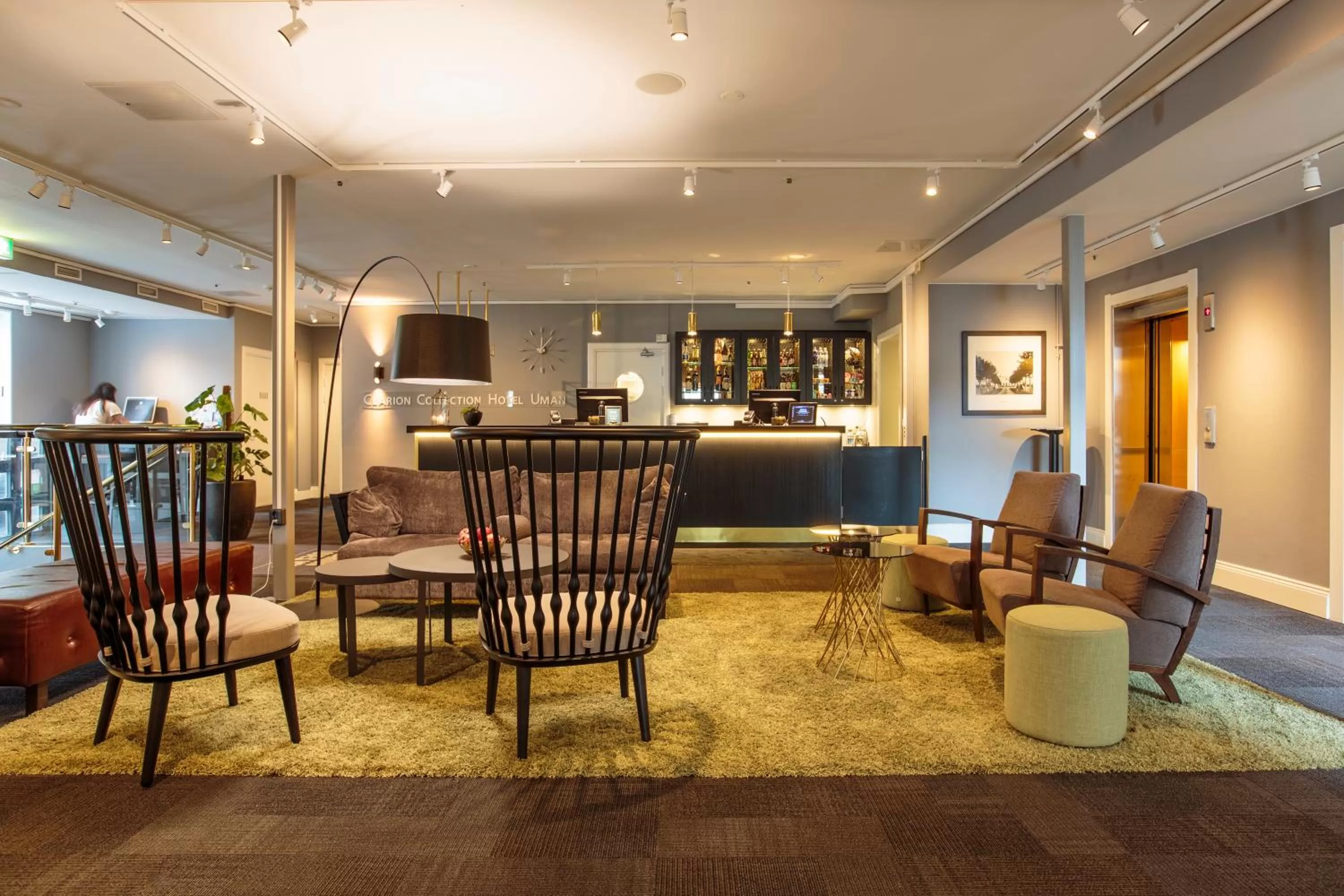 Communal lounge/ TV room in Clarion Collection Hotel Uman