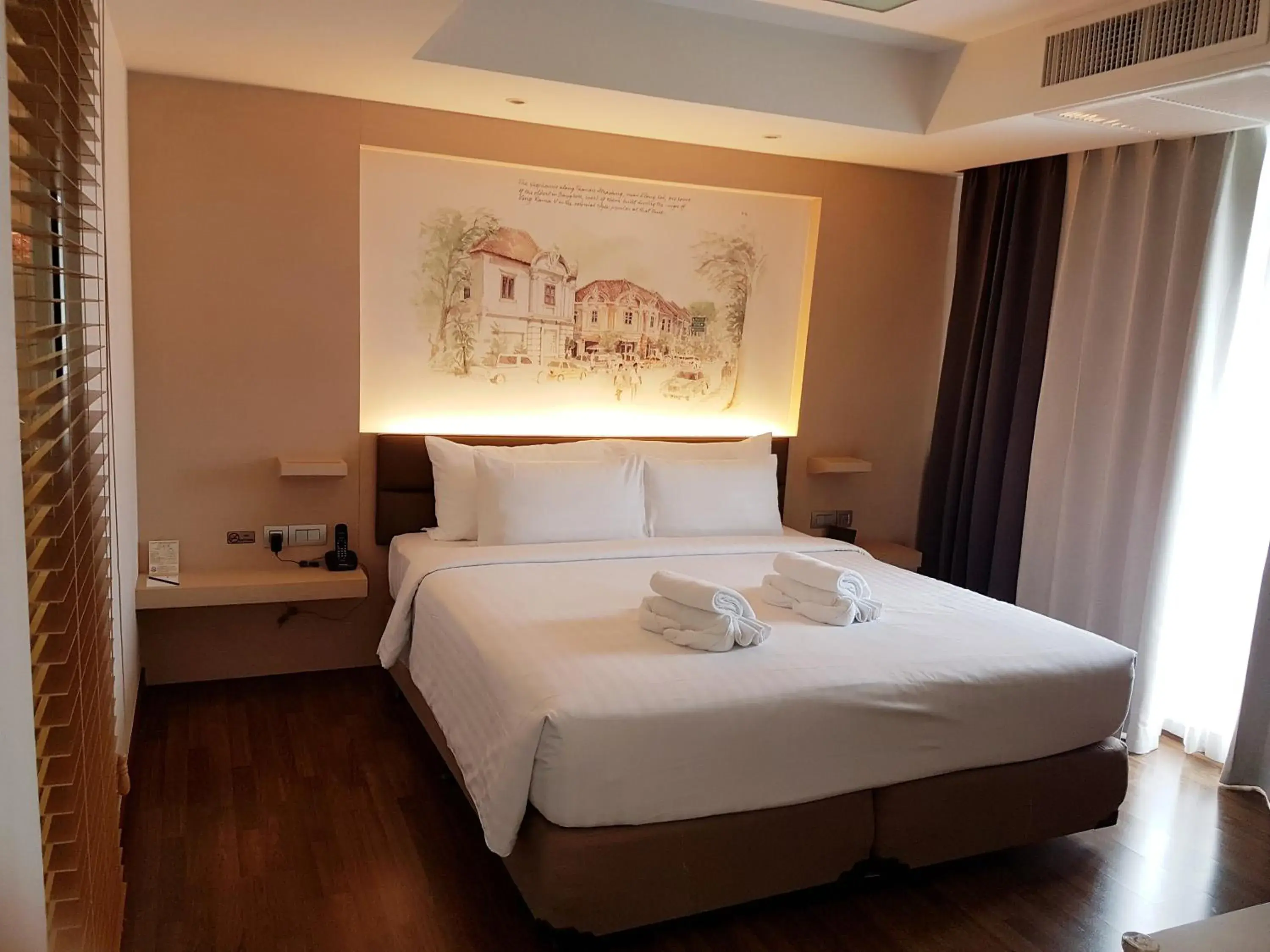 Bed in Parinda Hotel