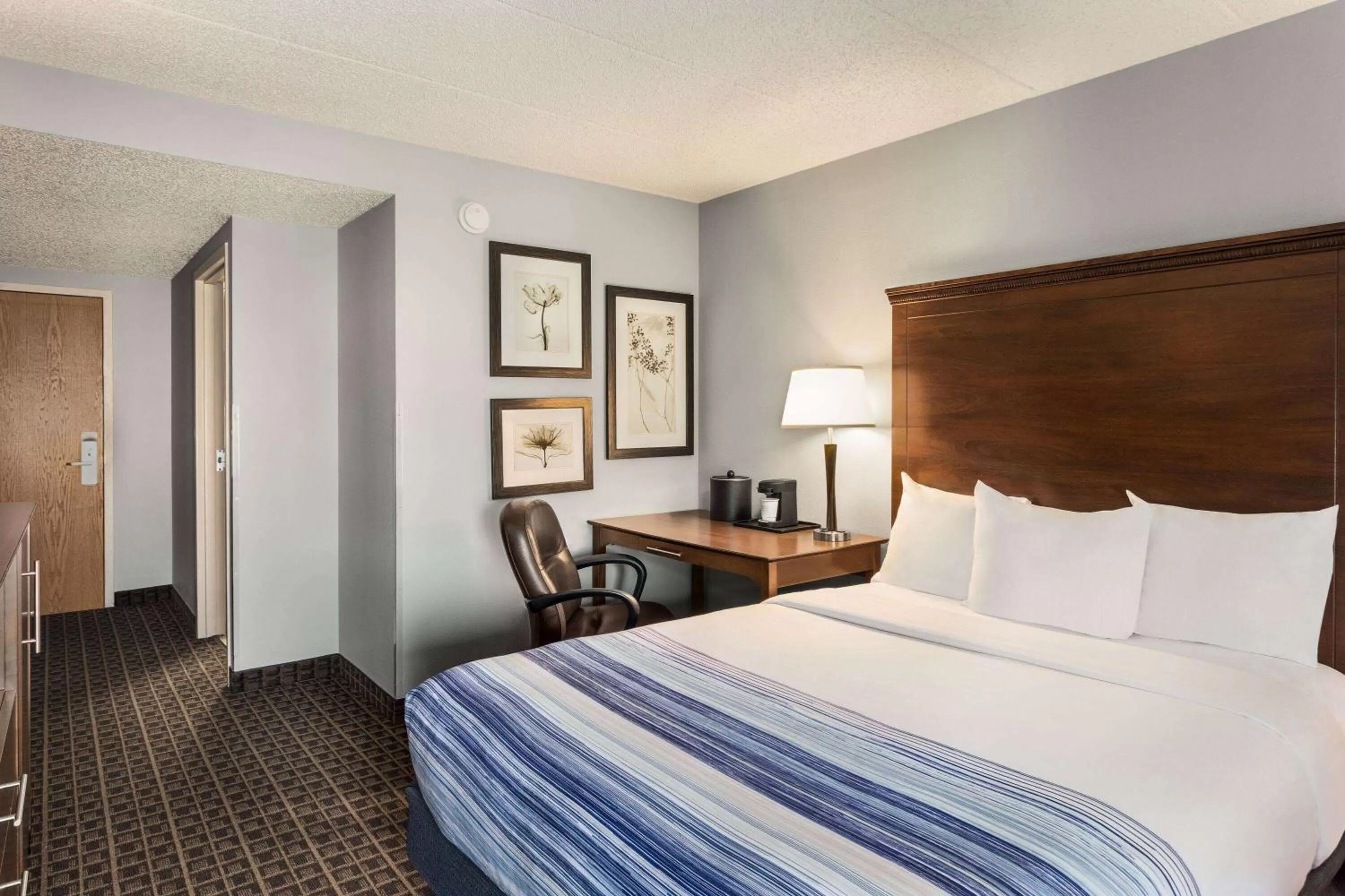 Photo of the whole room, Bed in AmericInn by Wyndham Madison West