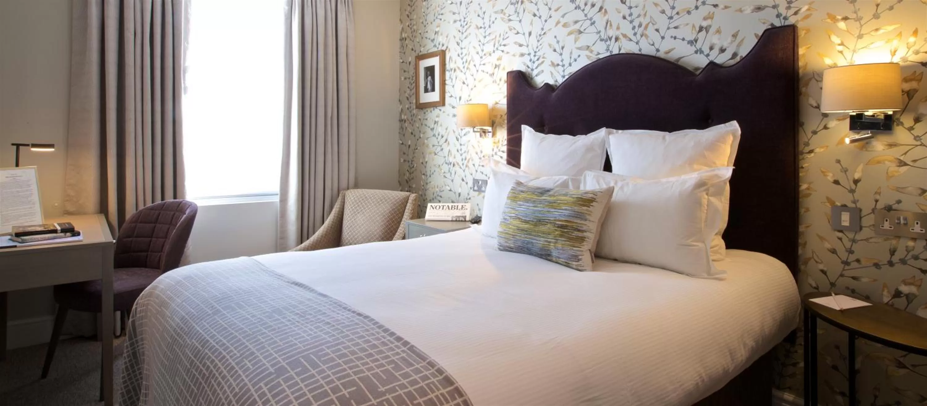 Bed in 54 Queen's Gate Hotel