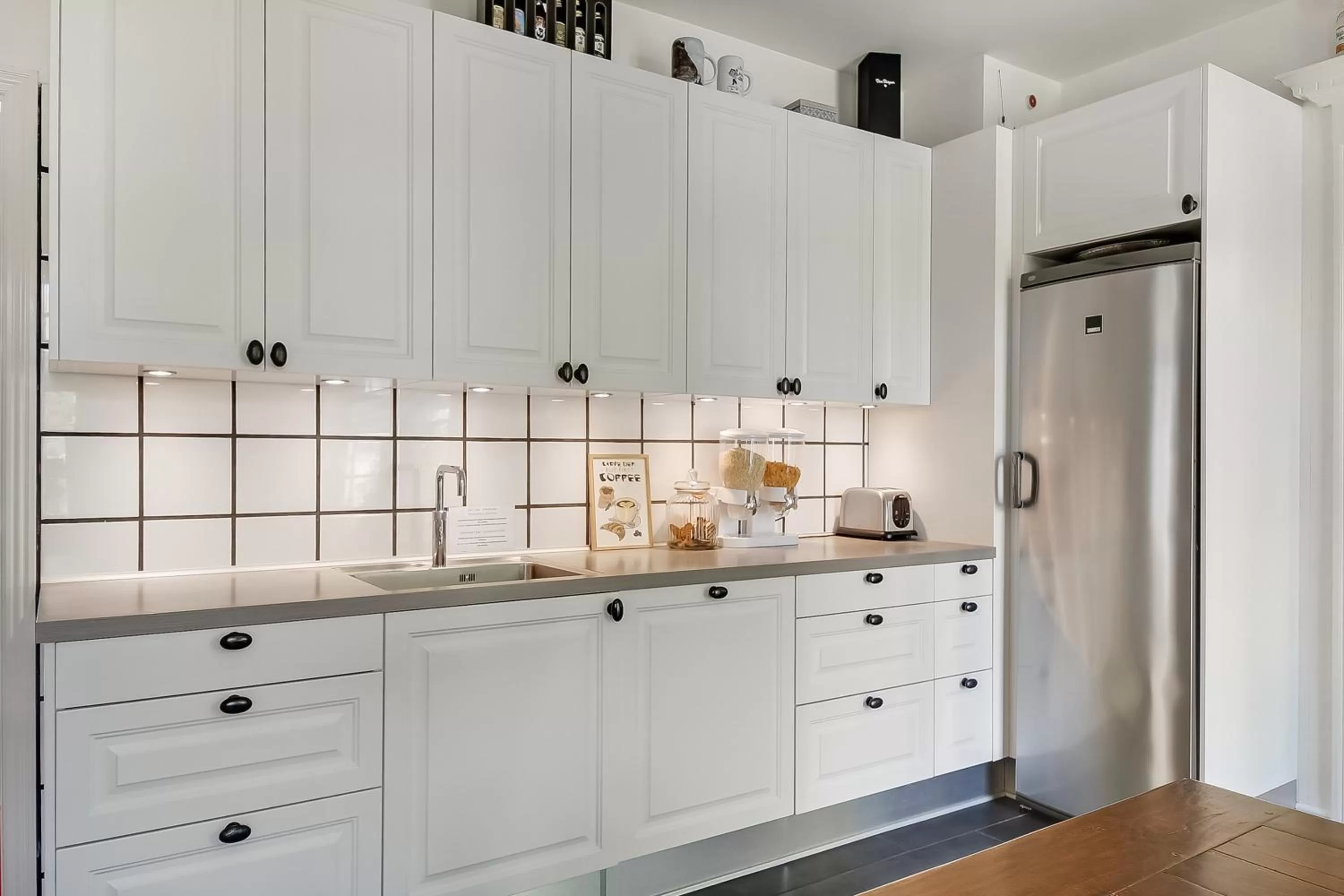 Communal kitchen in Sweethome Guesthouse