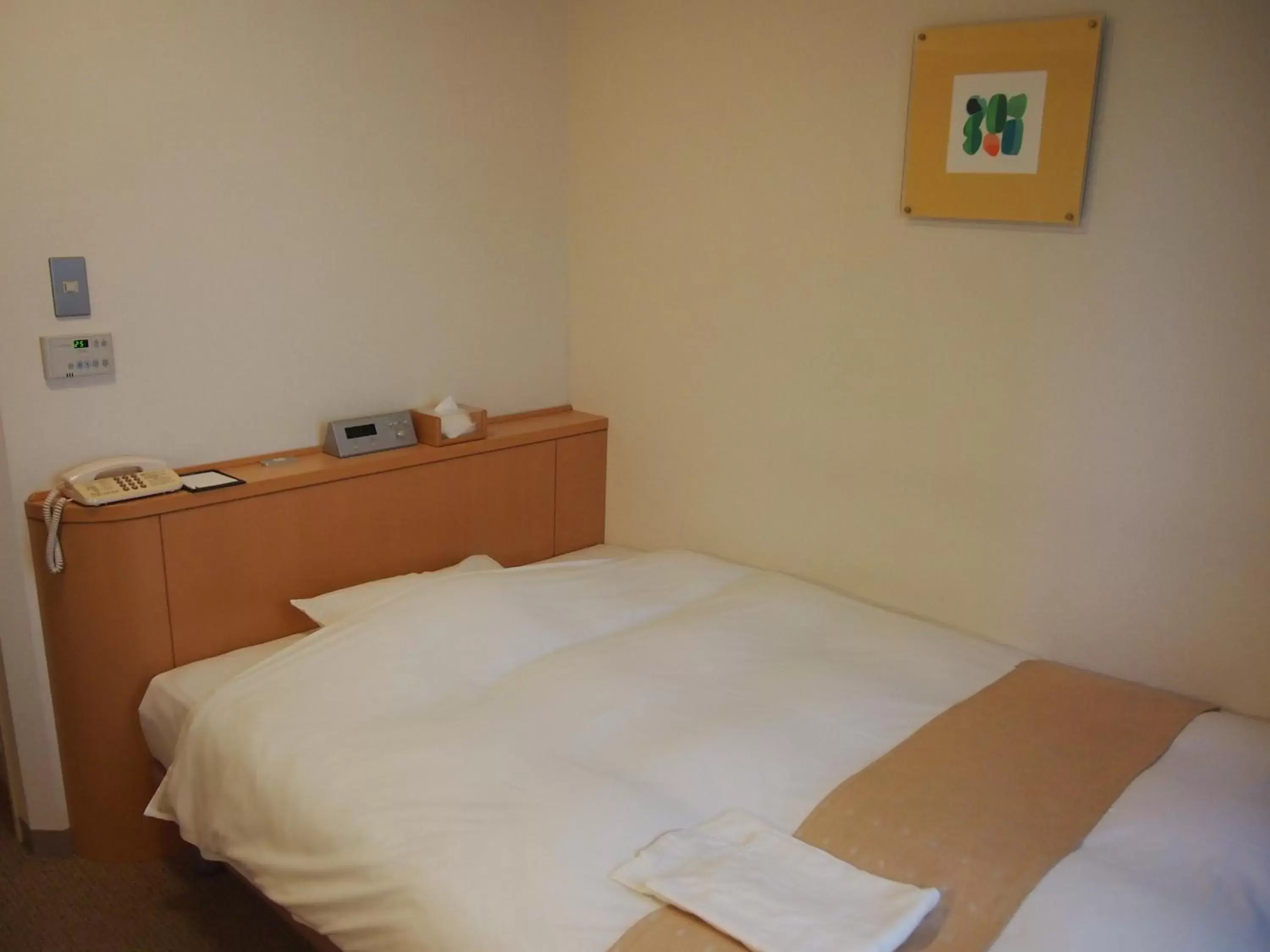 Bed in Nest Hotel Kumamoto