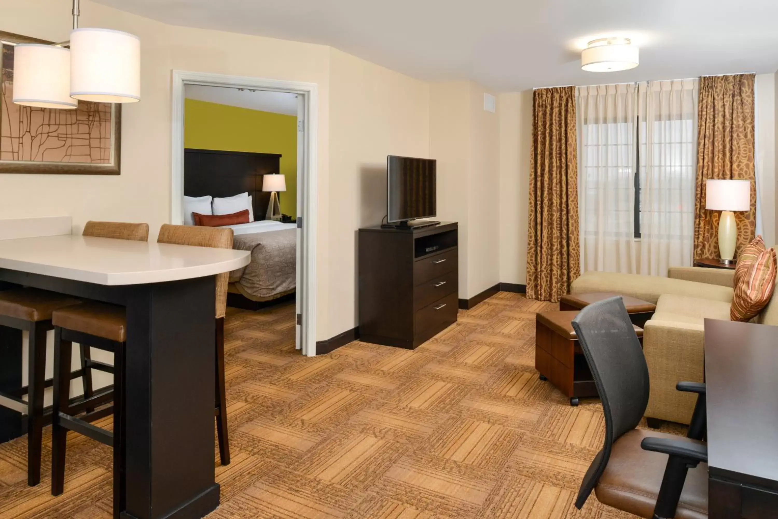 Photo of the whole room, Seating Area in Staybridge Suites Merrillville, an IHG Hotel