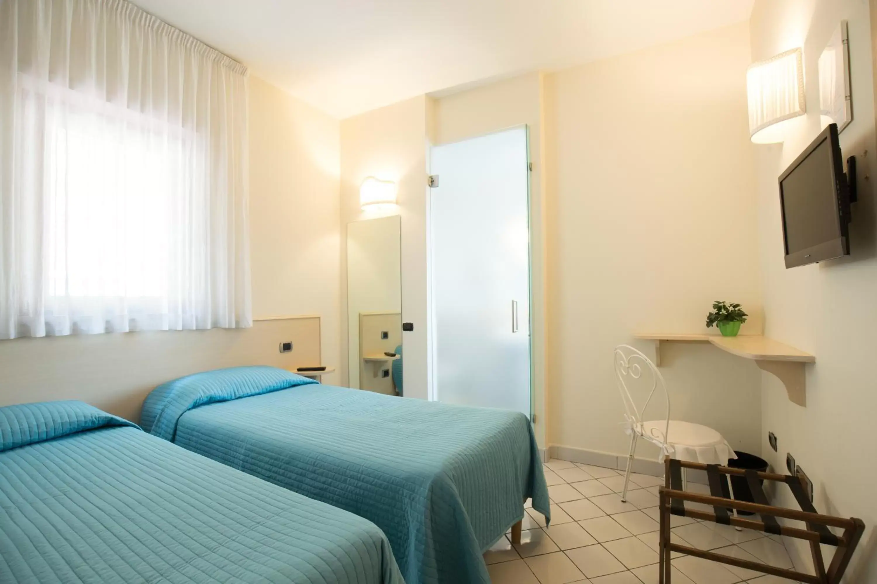 Bed in Hotel Villa Poseidon & Events