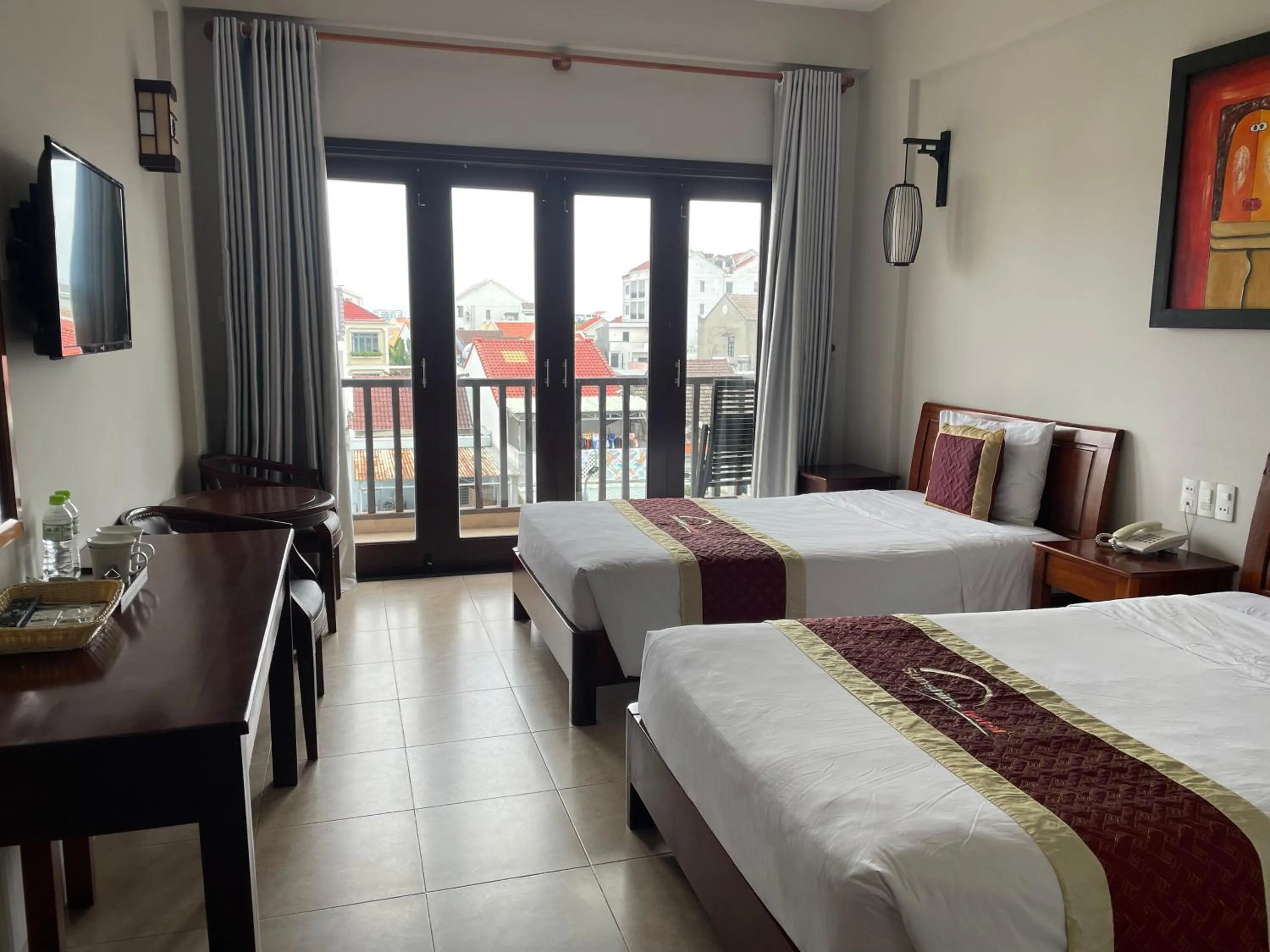 Bed in Sunshine Hoian Hotel