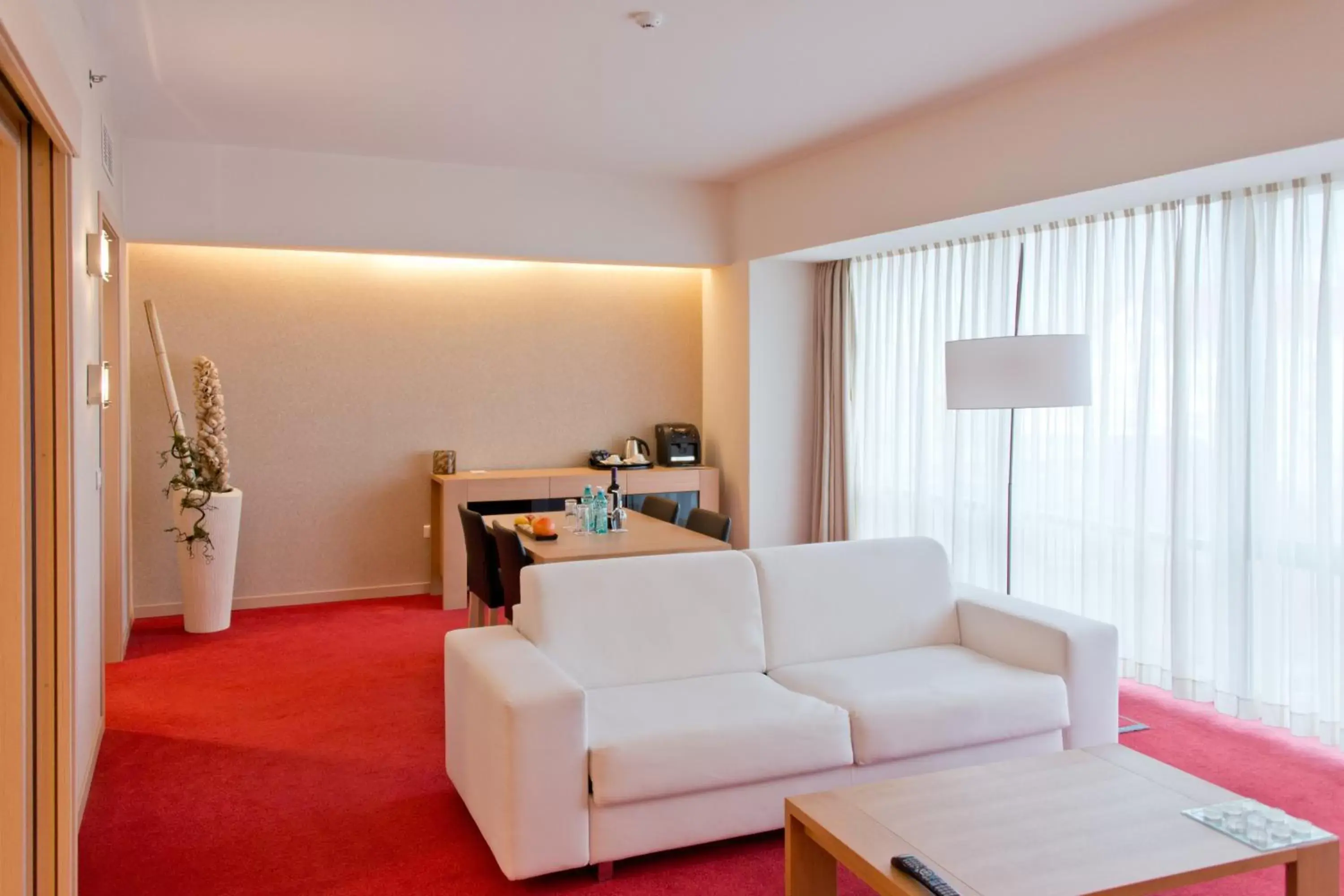 Bed, Seating Area in Ramada by Wyndham Oradea