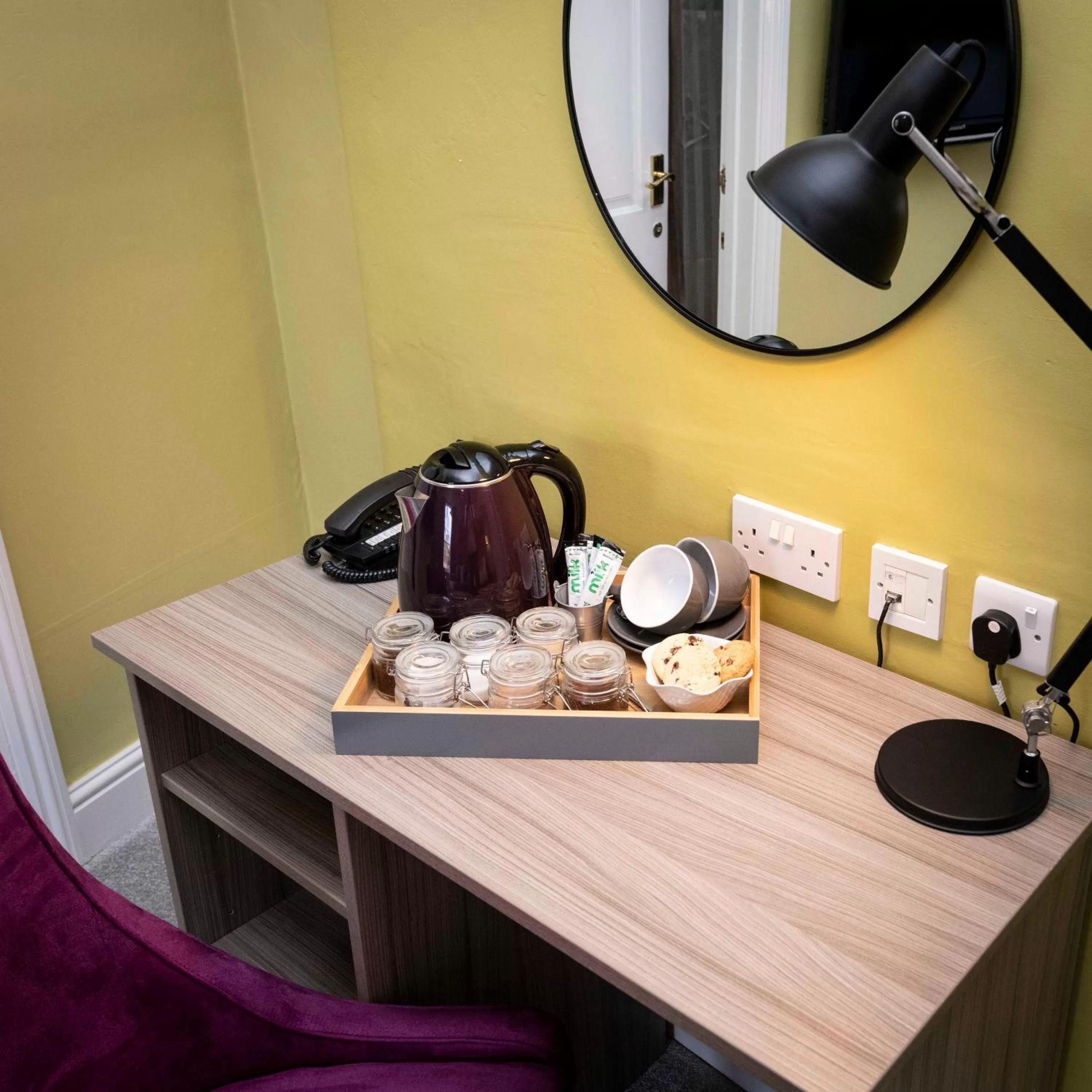 Coffee/tea facilities in Wisteria Hotel