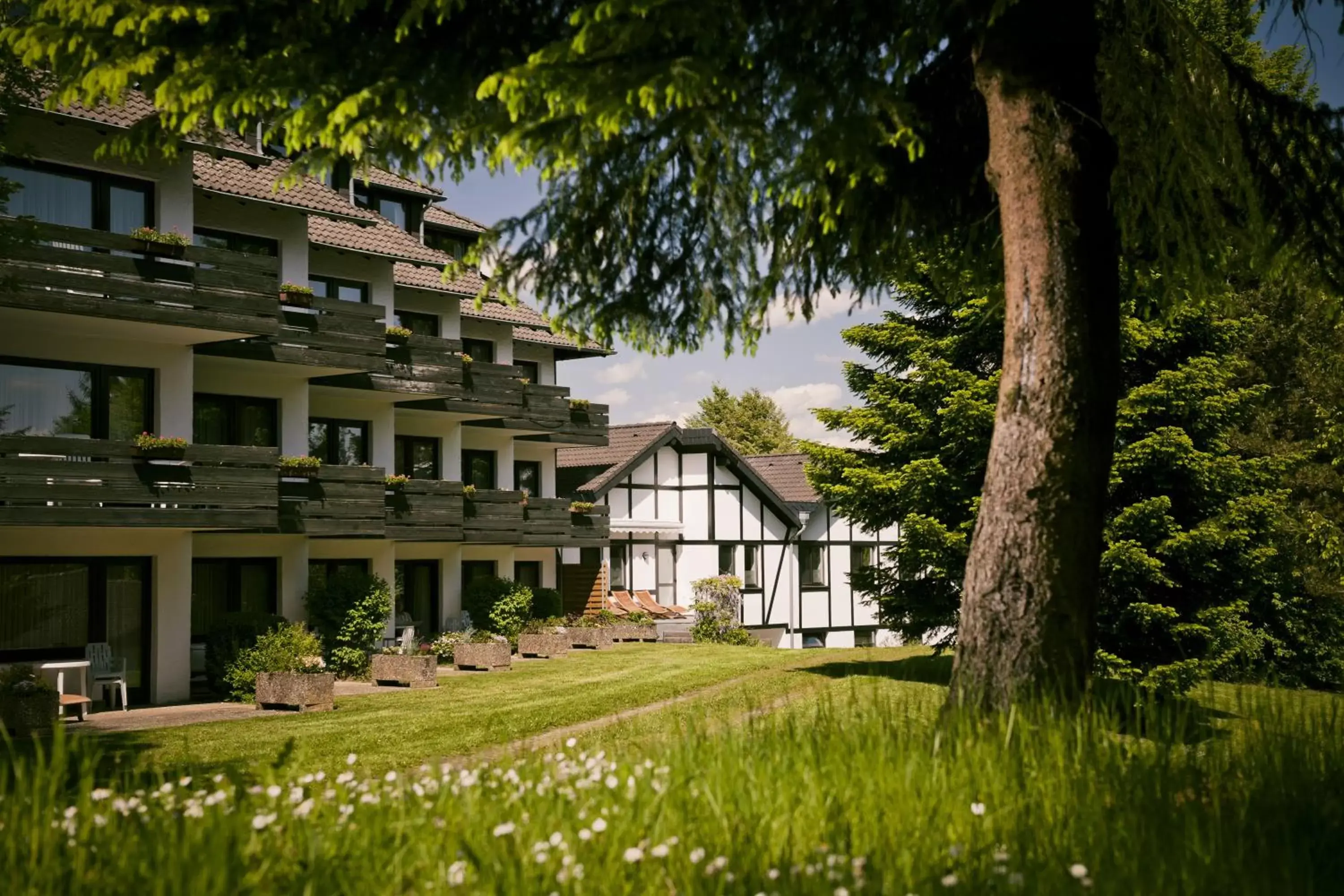 Garden view, Property Building in Sporthotel Grafenwald