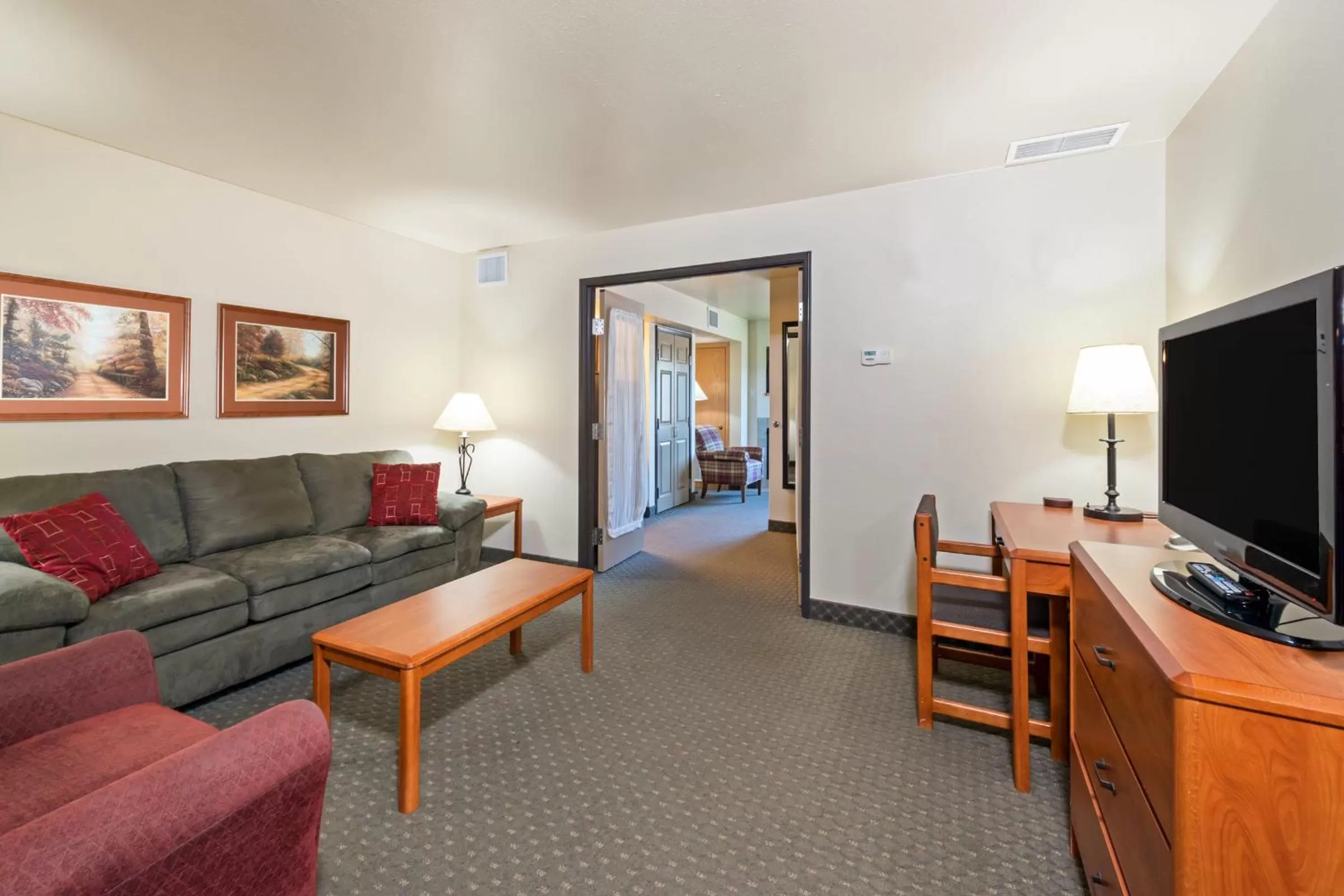 Living room in AmericInn by Wyndham Havre
