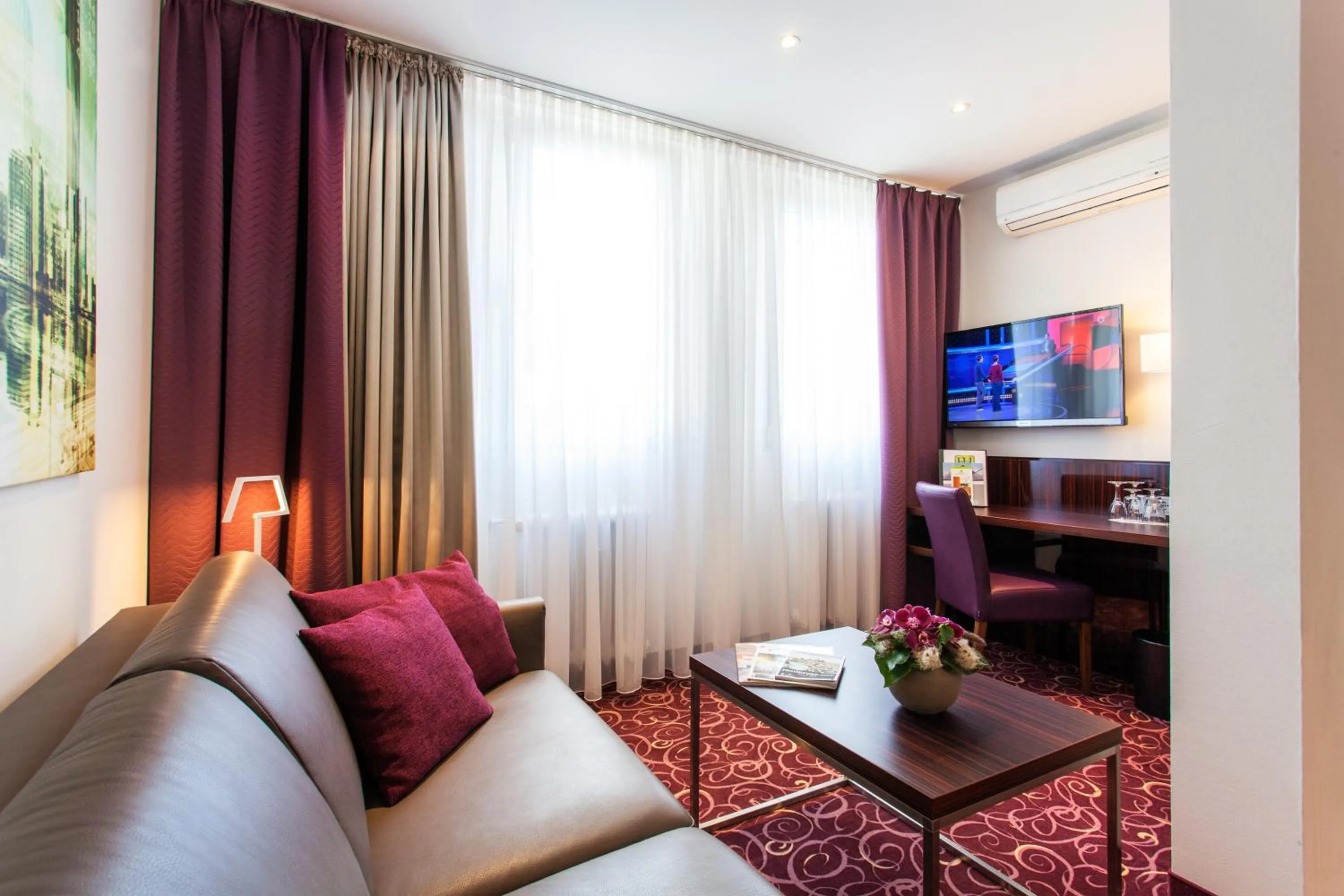 TV and multimedia in The Domicil Hotel Frankfurt City
