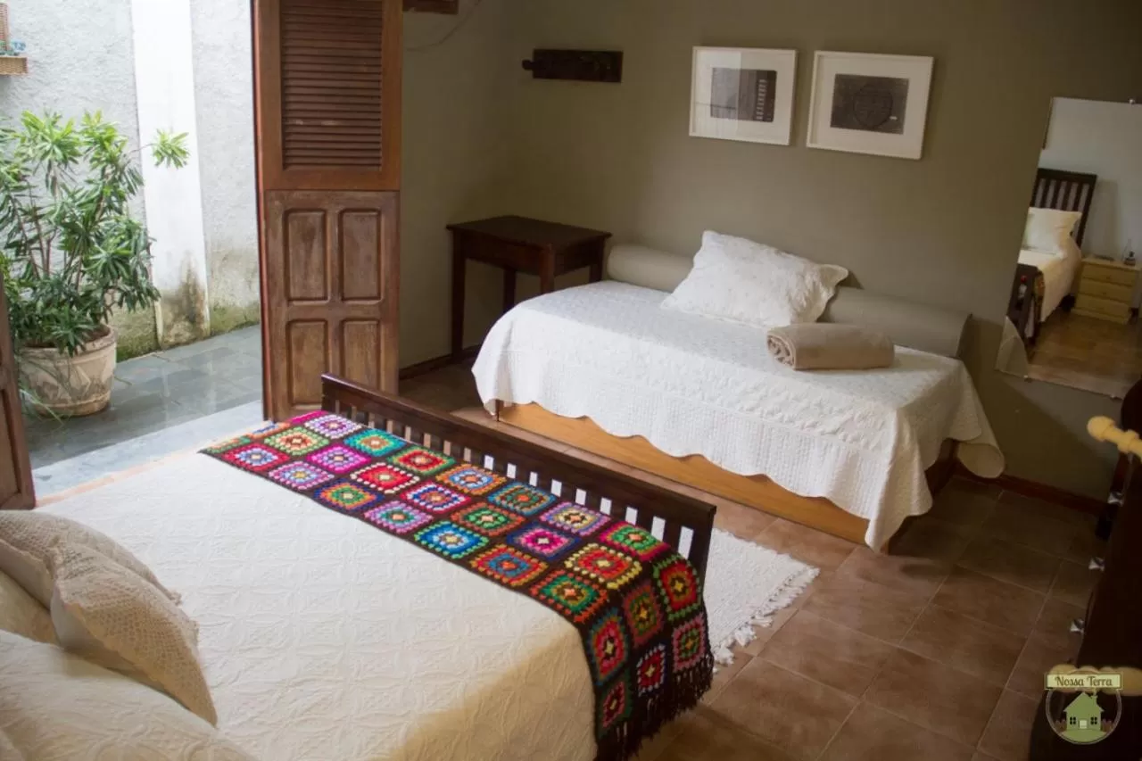 Bed in Pousada Nossa Terra