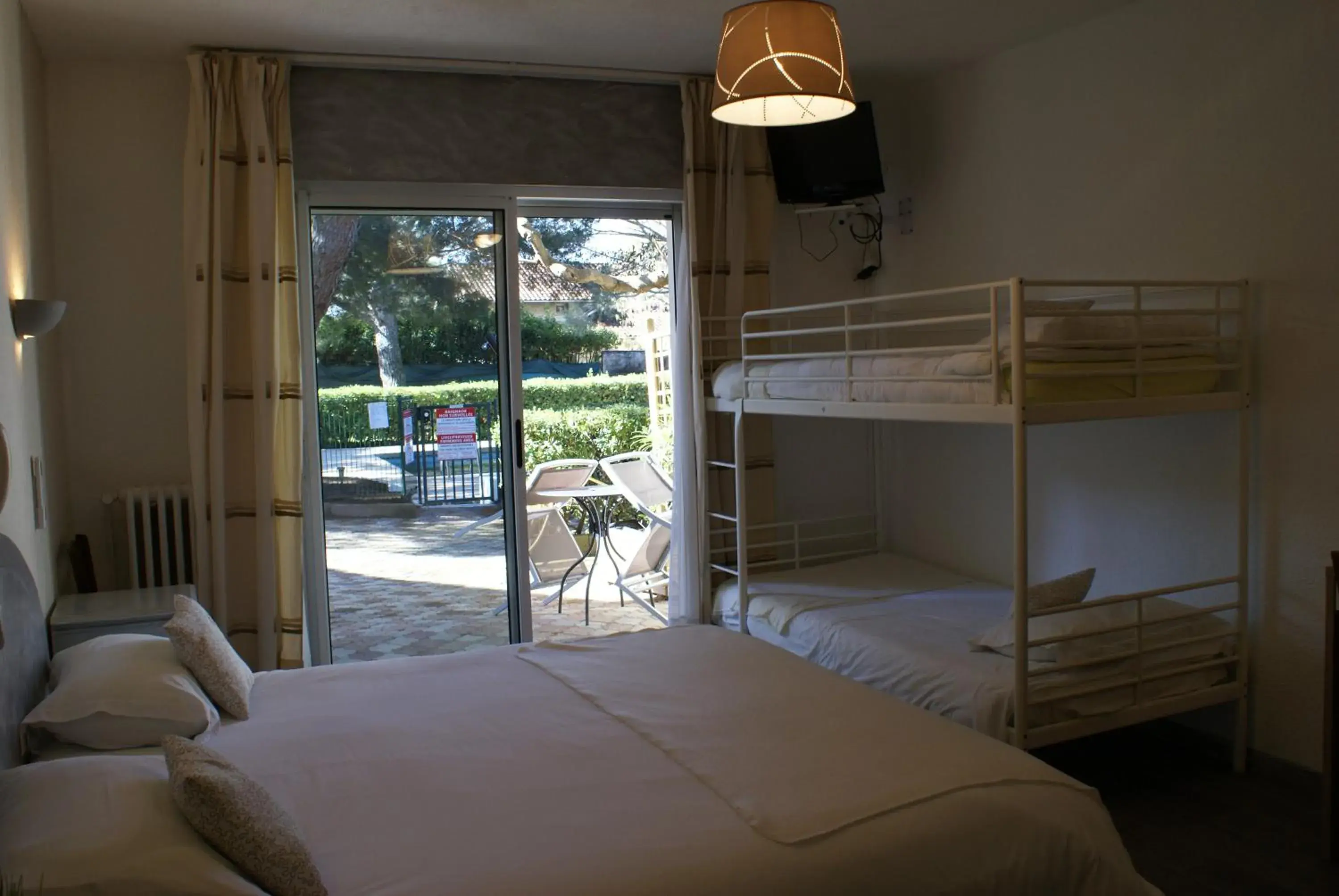 Bedroom in Le Petit Manoir Logis