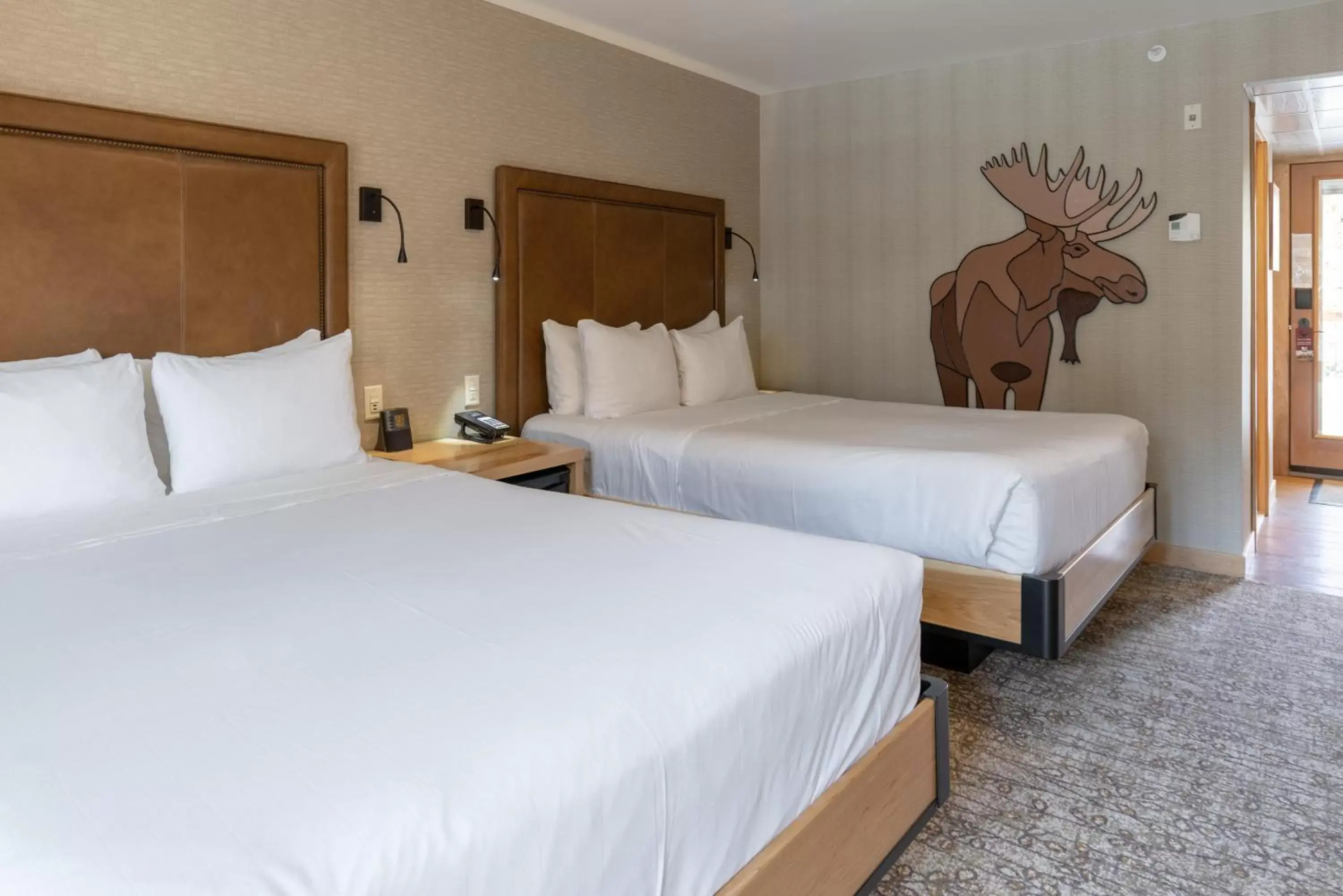 Bed in Moose Hotel and Suites