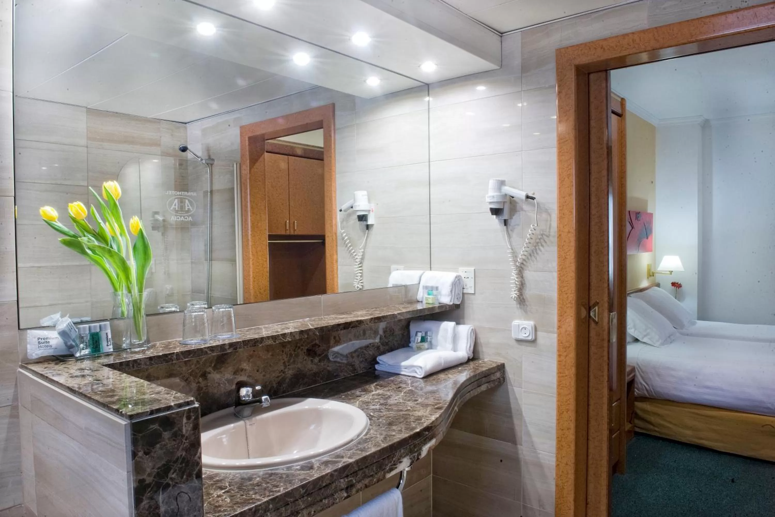Bathroom, Bed in Acacia Suite