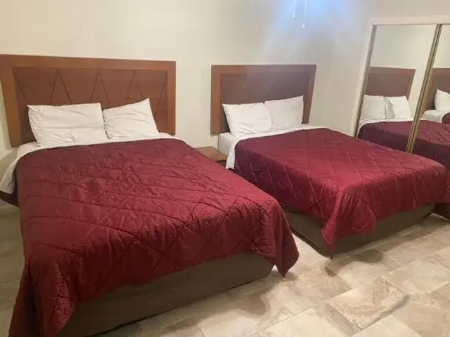 Bed in Mountain Trail Lodge and Vacation Rentals