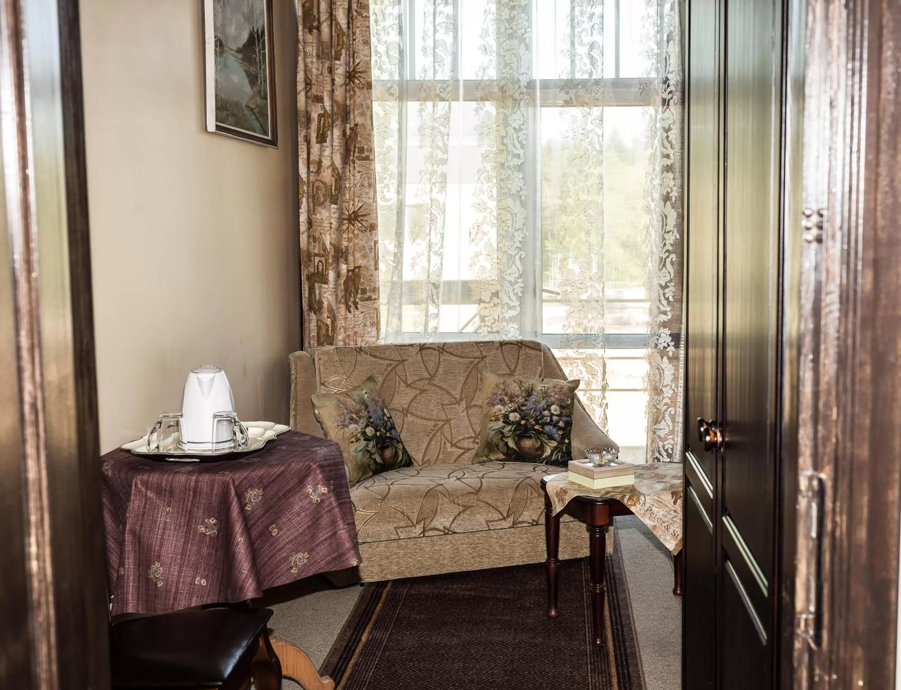 Seating area in City Center Kaķis B&B