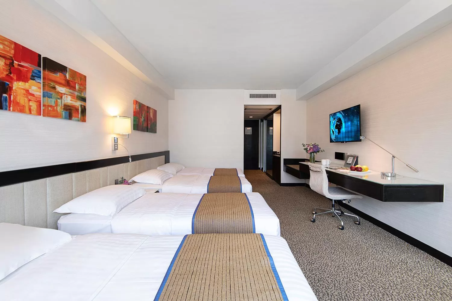 Bed in Regal Riverside Hotel