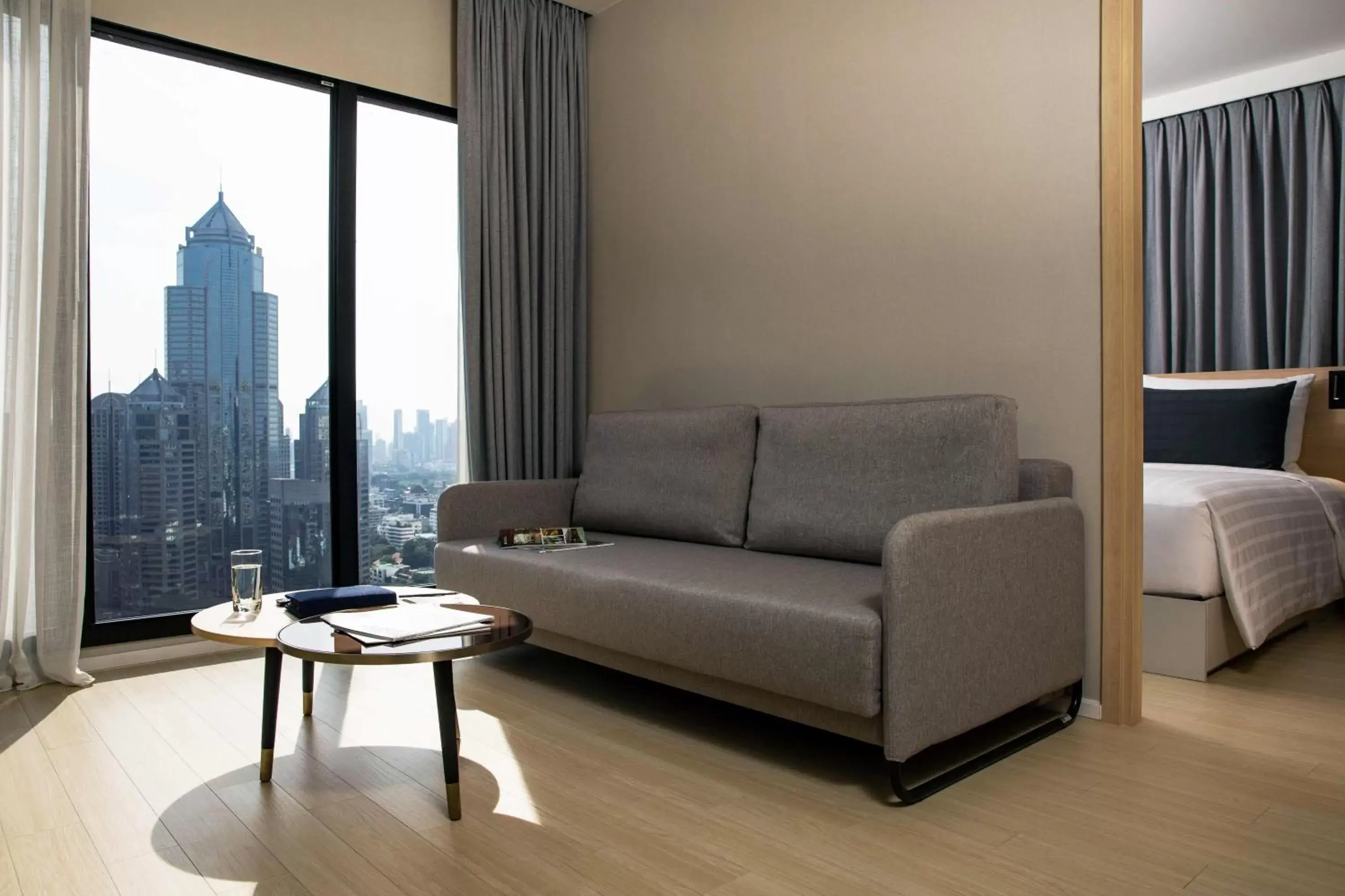Bed, Seating Area in Sindhorn Midtown Hotel Bangkok, Vignette Collection - an IHG Hotel