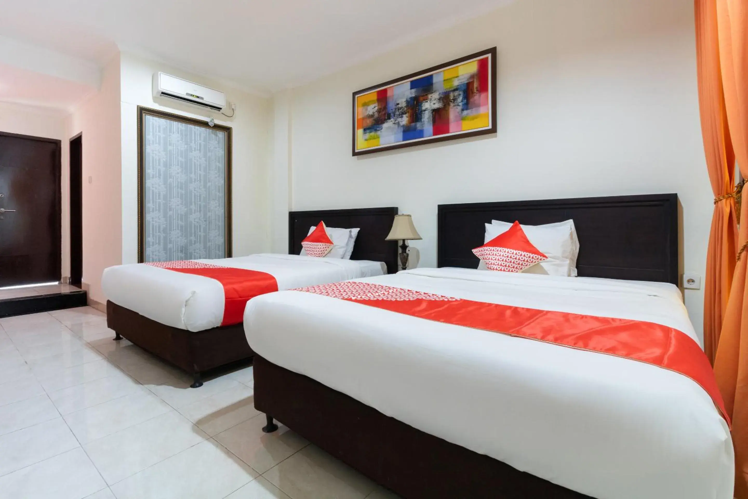 Bedroom, Bed in SUPER OYO Flagship 2688 Guntur Hotel