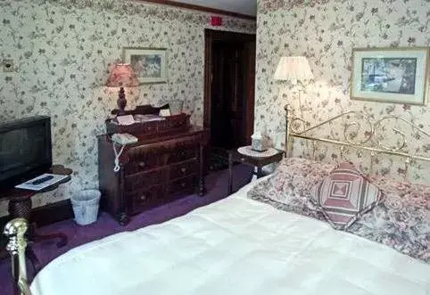 Bed in Woodstock Inn, Station and Brewery