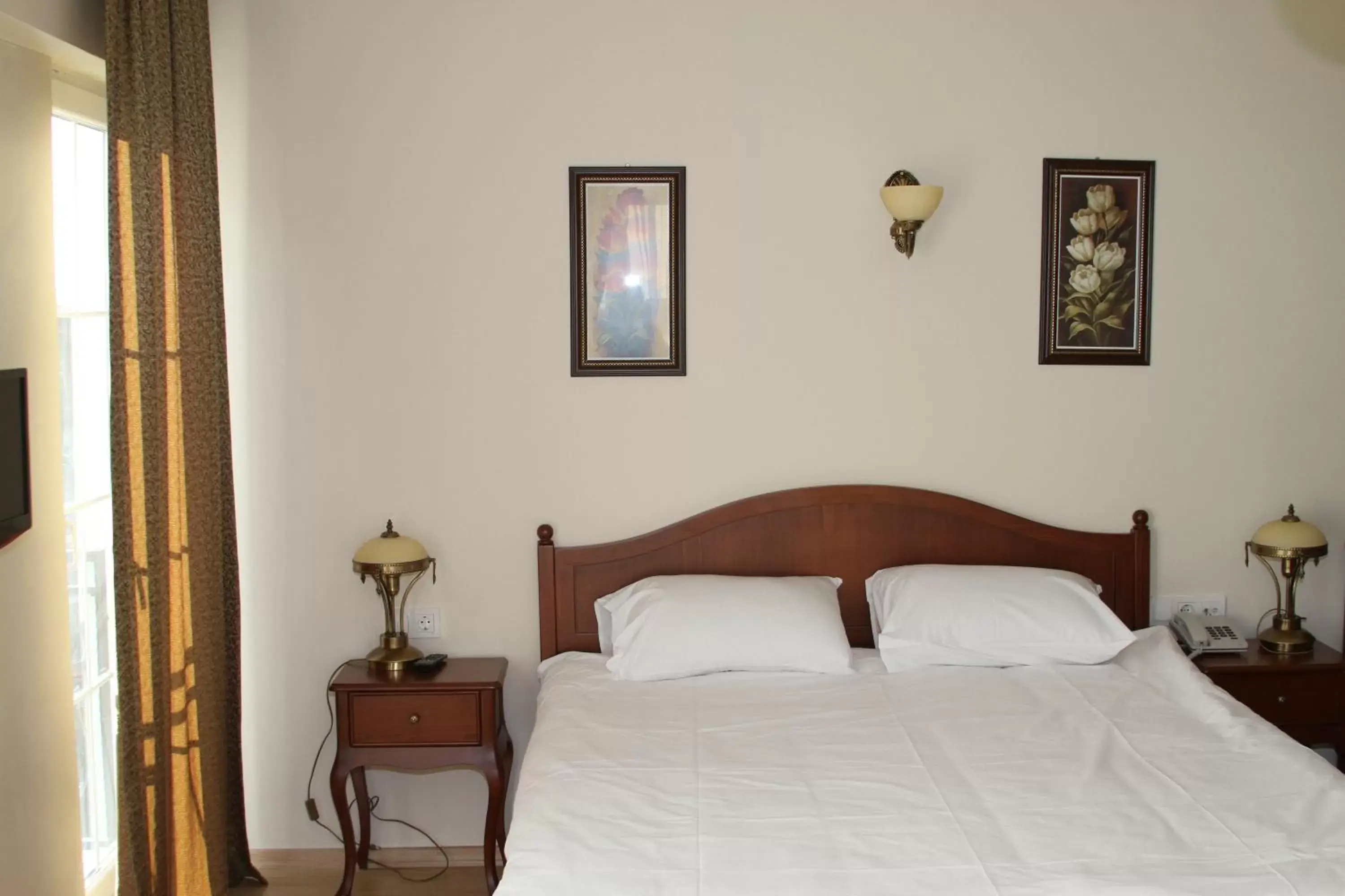 Bed in Basileus Hotel
